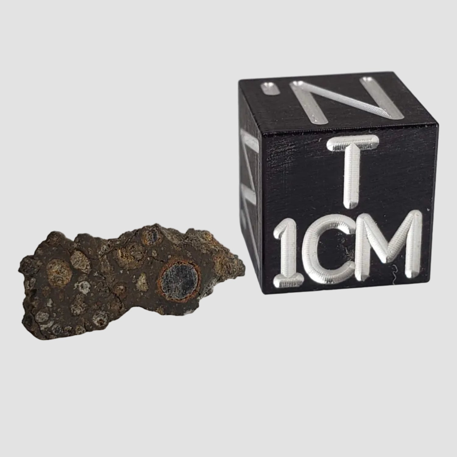 NWA 2086 Meteorite | 0.18 Grams | End Cut | CV3 Carbonaceous