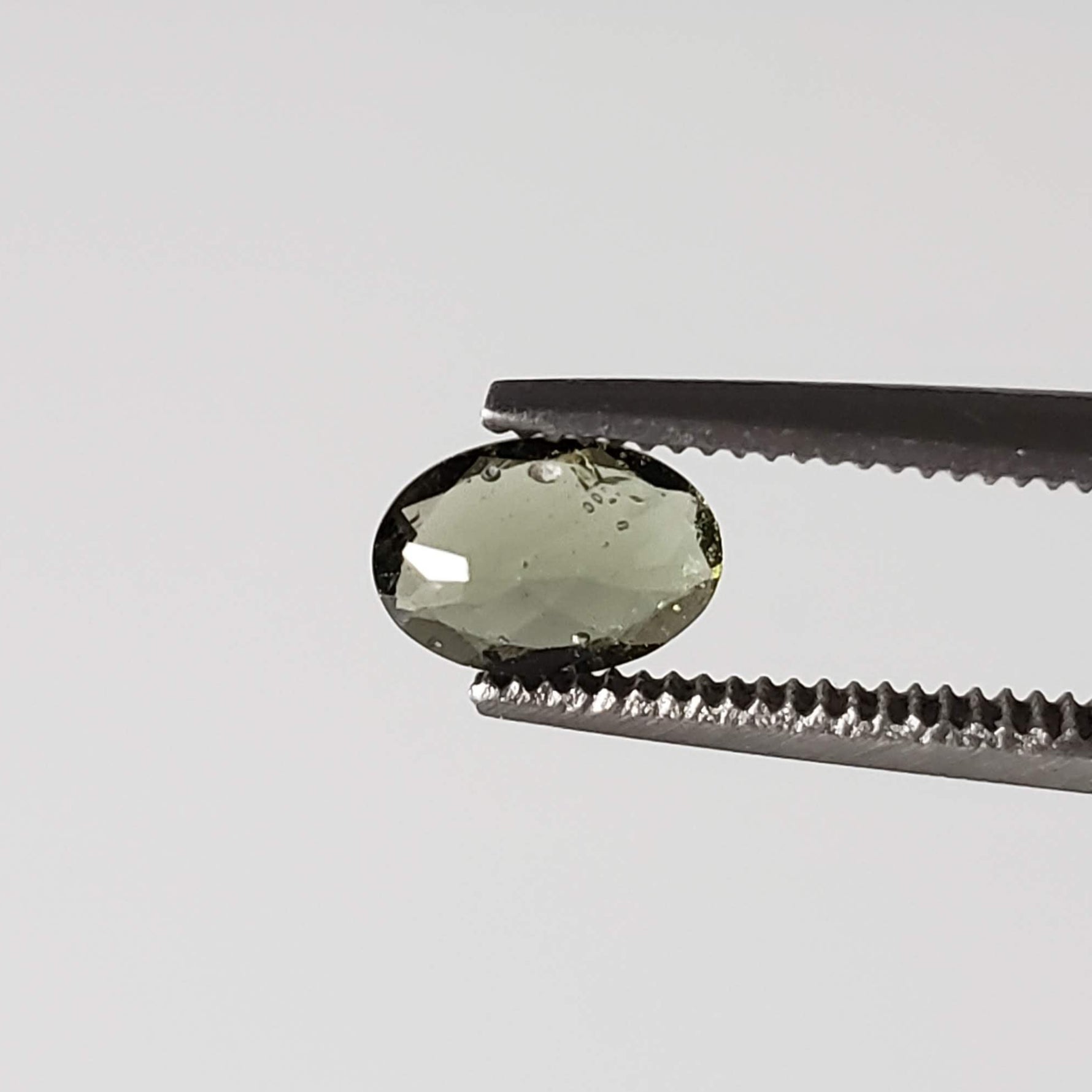  Authentic Moldavite | 2 Piece Lot | Oval Cut | 6x4mm | Chlum Region, Czech Republic 9