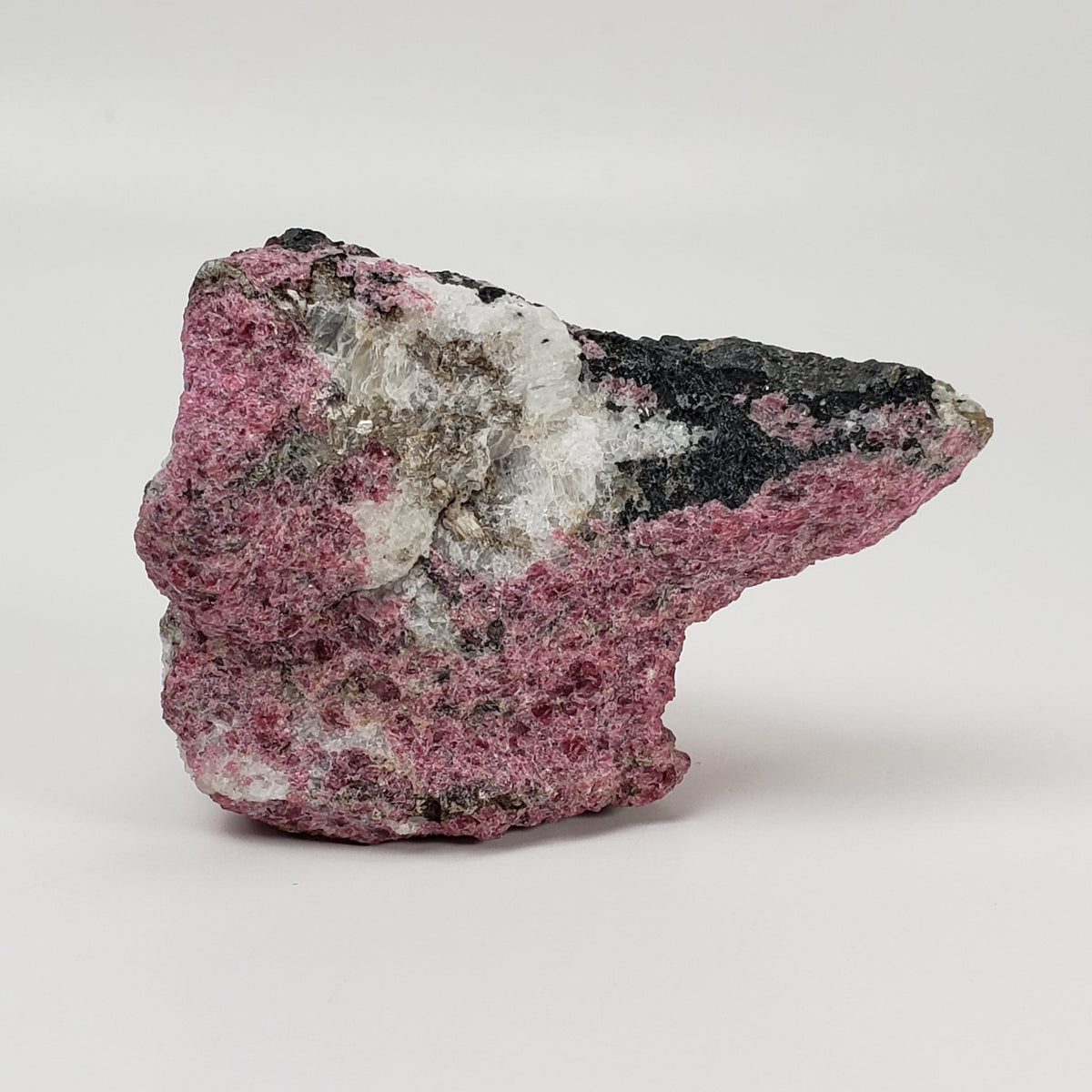  Eudialyte | Fluorescent under UV light | 160.5 grams | Kipawa, Quebec, Canada | SO24 