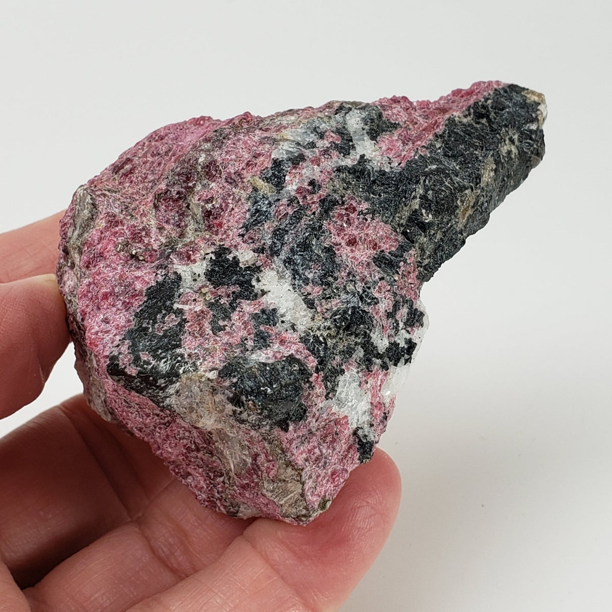  Eudialyte | Fluorescent under UV light | 160.5 grams | Kipawa, Quebec, Canada | SO24 5