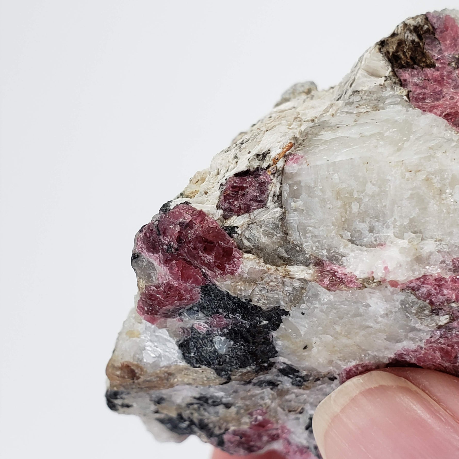  Eudialyte | Fluorescent under UV light | 170 grams | Mont Saint Hilaire, Québec, Canada 6