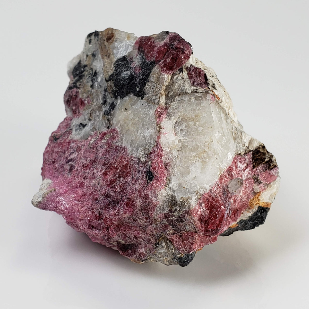  Eudialyte | Fluorescent under UV light | 170 grams | Mont Saint Hilaire, Québec, Canada 4