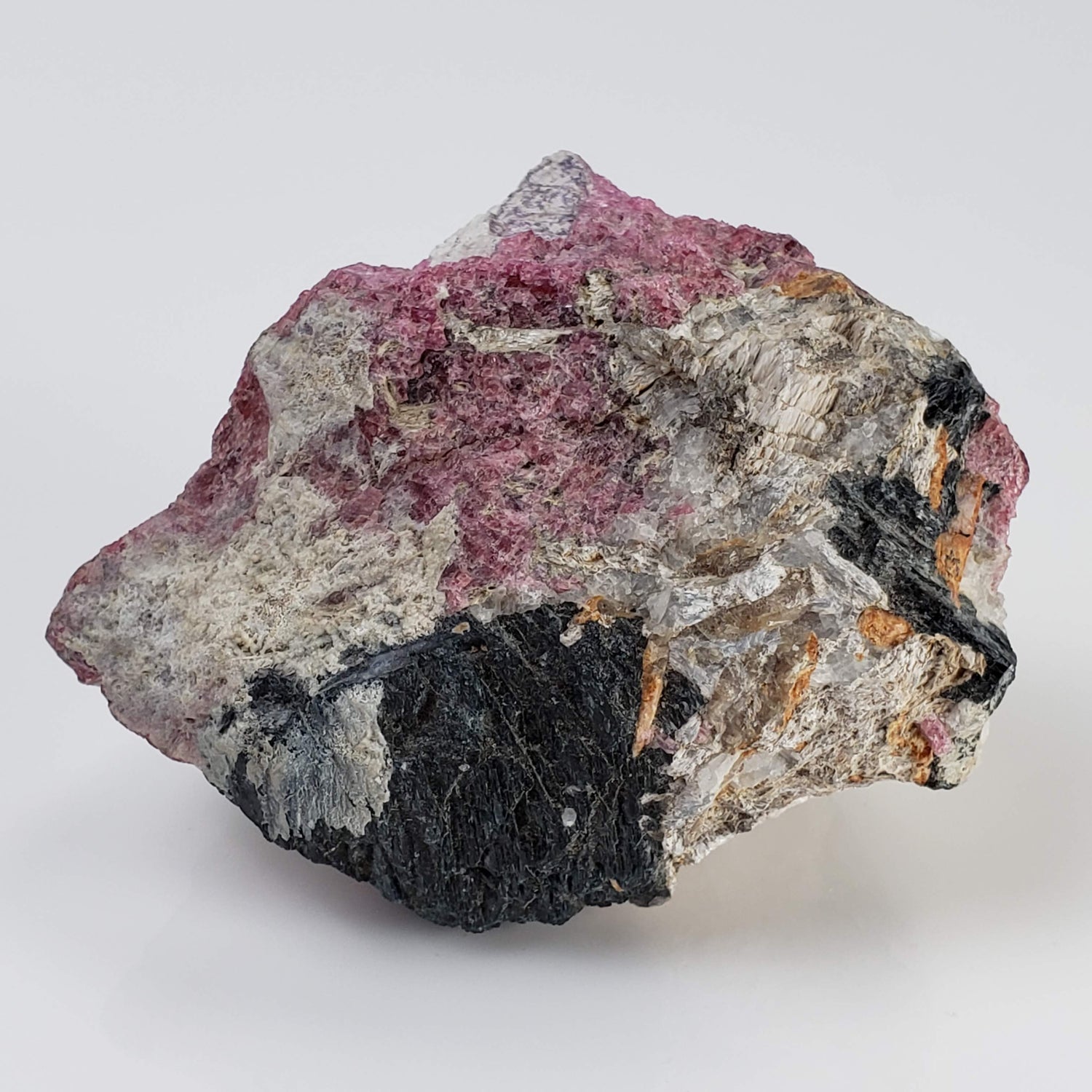  Eudialyte | Fluorescent under UV light | 170 grams | Mont Saint Hilaire, Québec, Canada 1
