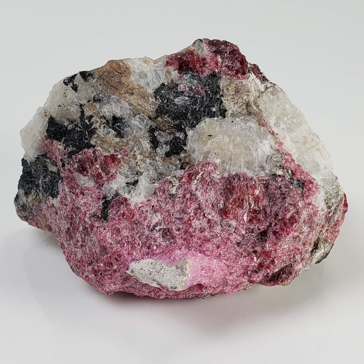  Eudialyte | Fluorescent under UV light | 170 grams | Mont Saint Hilaire, Québec, Canada 3