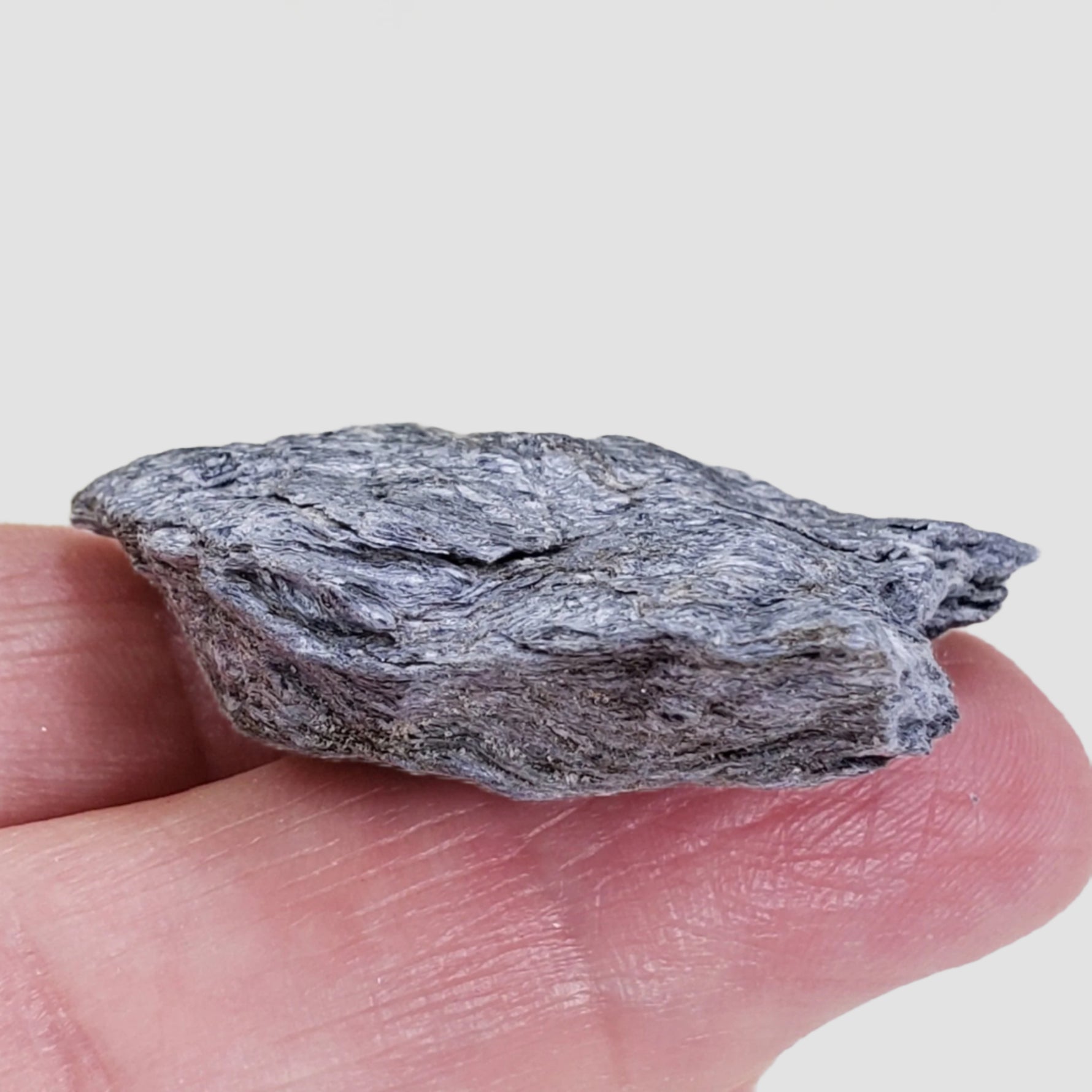  Holmquistite | 14.7 grams | Quebec Lithium Mine, Barraute, Quebec, Canada 3