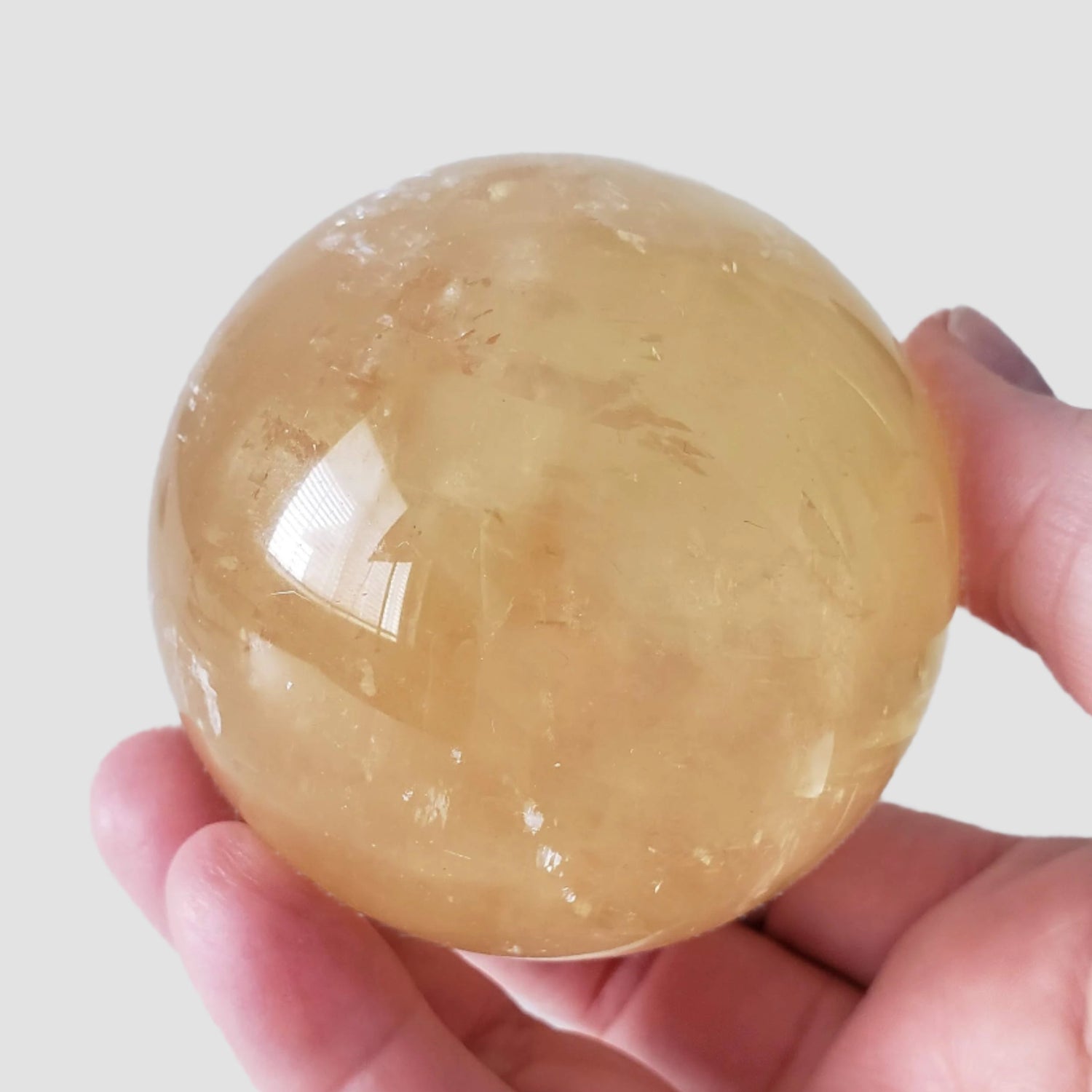  Natural Amber Calcite Sphere | 73 mm, 2.7 inches | 540 grams | China 