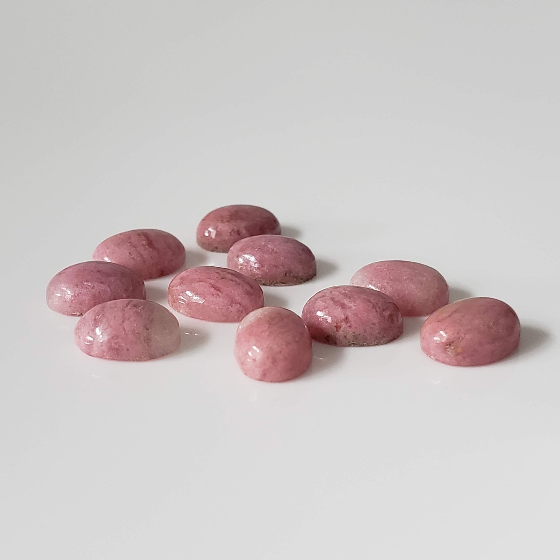  Rhodonite | 10 Piece Gemstone Lot | Oval Cabochon | Pink | 7.7-8.0x5.7-6.0mm 15.1tcw 1