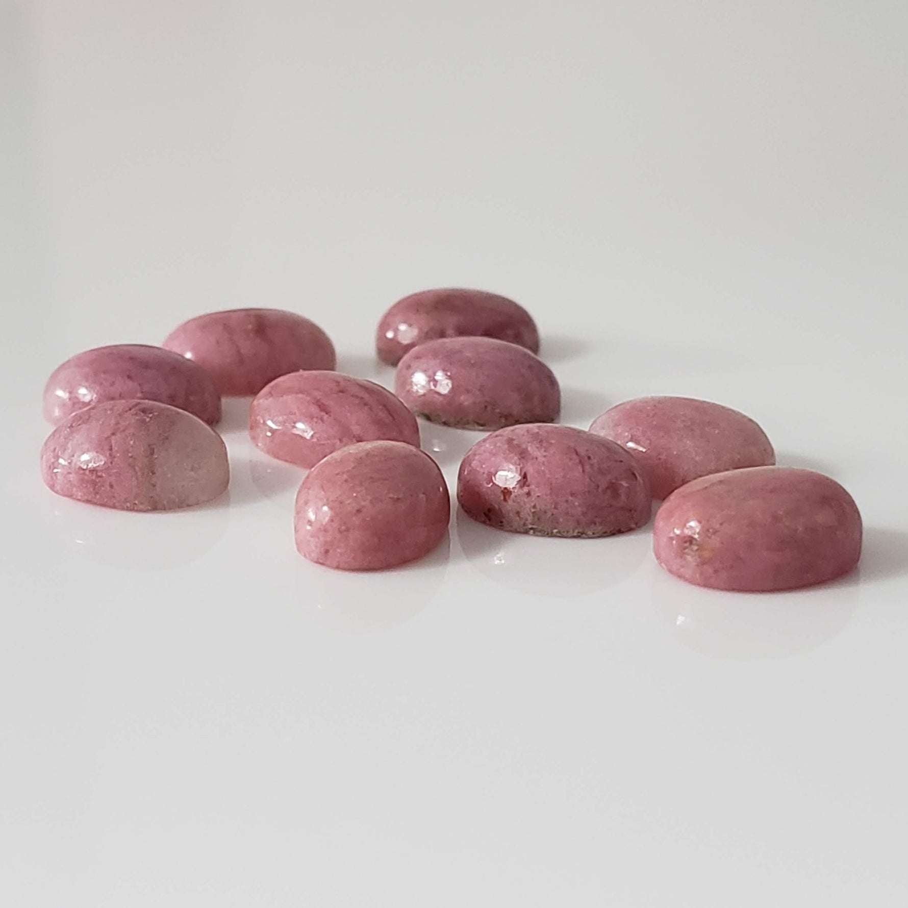 Rhodonite | 10 Piece Gemstone Lot | Oval Cabochon | Pink | 7.7-8.0x5.7-6.0mm 15.1tcw 2