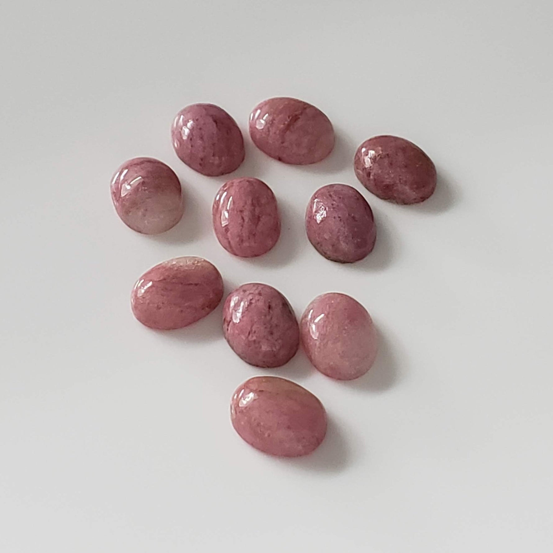  Rhodonite | 10 Piece Gemstone Lot | Oval Cabochon | Pink | 7.7-8.0x5.7-6.0mm 15.1tcw 3