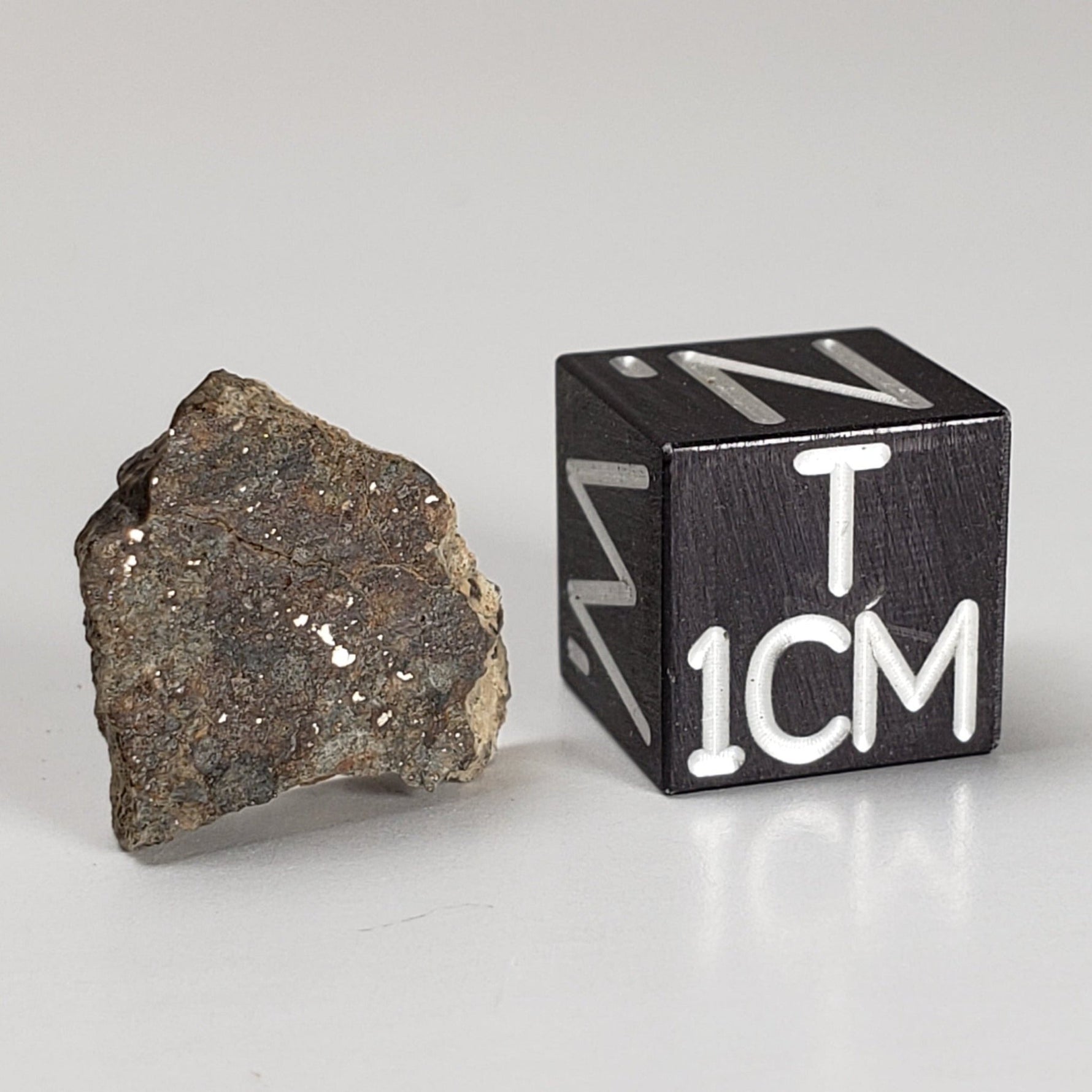  Sahara 02500 Meteorite | 0.98 Gr | Slice | L3 Chondrite | Wadi Mellene, Algeria | Sahara Desert | SO24 