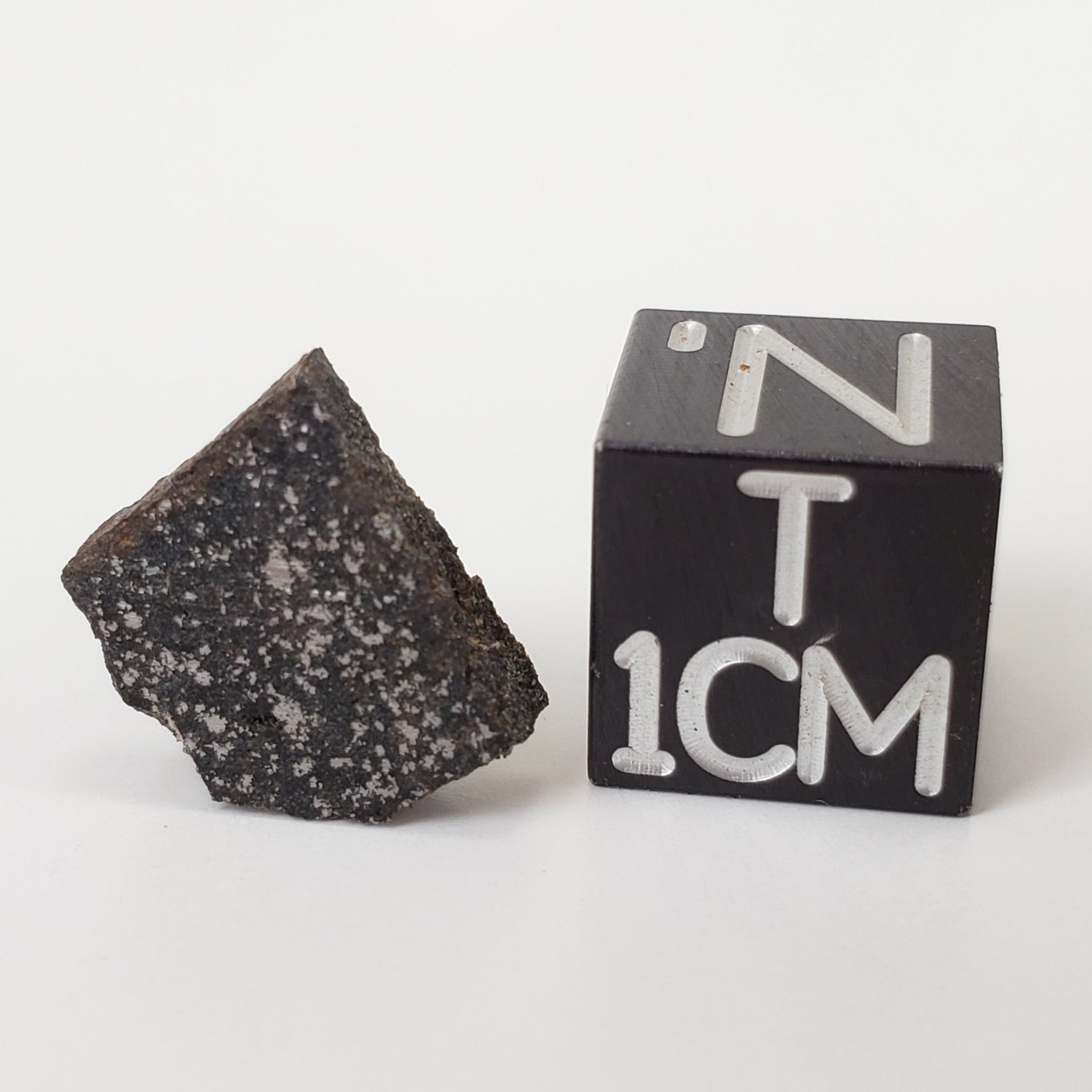  Spade Meteorite | 0.8 Grams | Part Slice | H6 Chondrite | Lamb County, Texas 