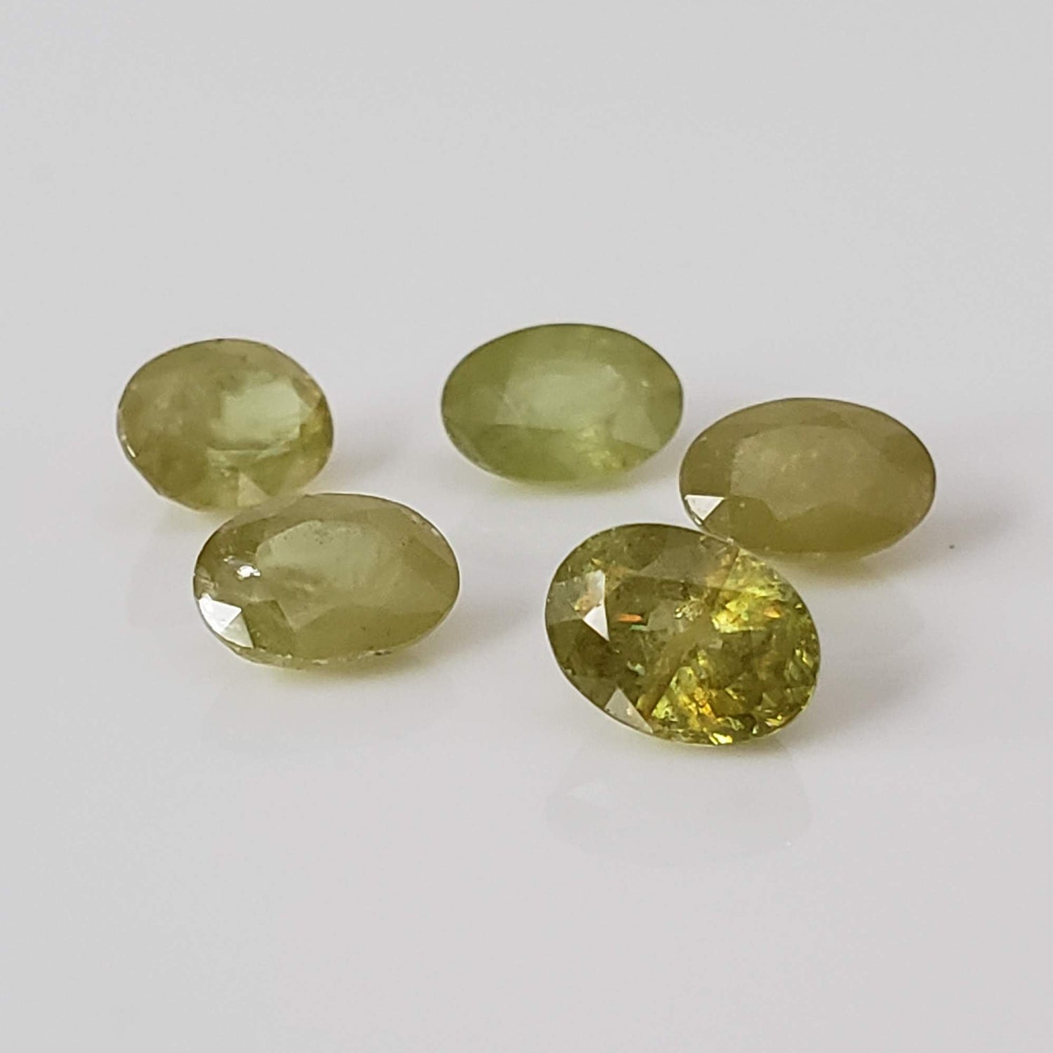  Sphene | 5 Piece Gemstone Lot | Oval Cut | Lime Green | 6.7x4.7-4.9mm 4.64tcw 1