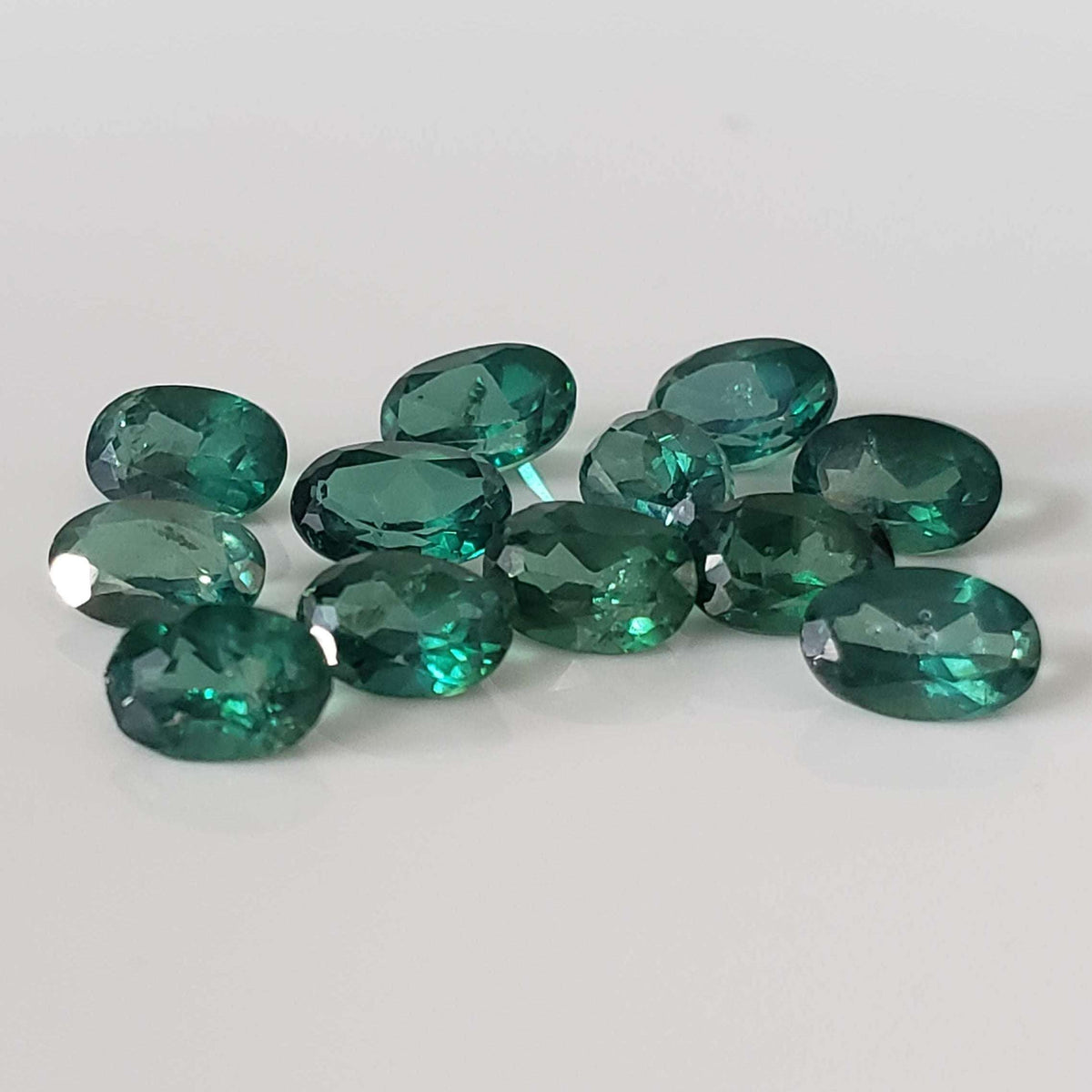  Topaz | 12 Piece Lot | Oval Cut | Emerald Green | 5.8-6.0x3.8-4.0mm 