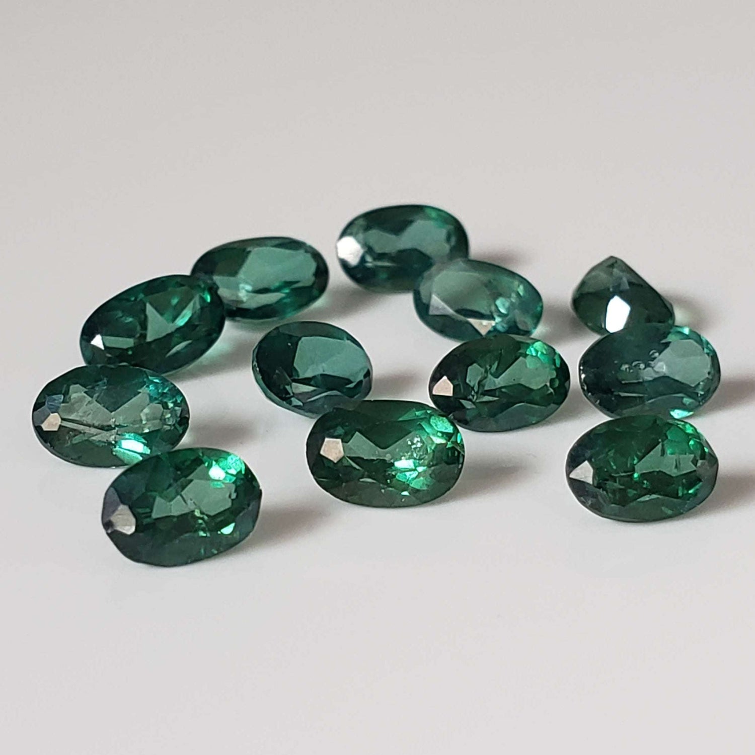  Topaz | 12 Piece Lot | Oval Cut | Emerald Green | 5.8-6.0x3.8-4.0mm 1