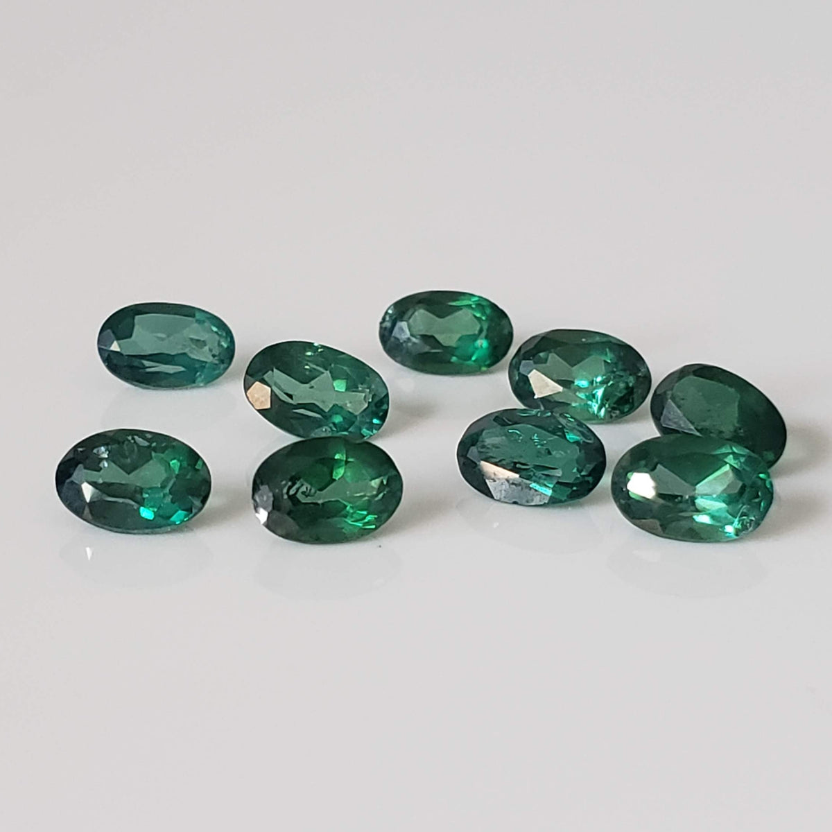  Topaz | 9 Piece Lot | Oval Cut | Emerald Green | 5.8-6.0x3.8-4.0mm 
