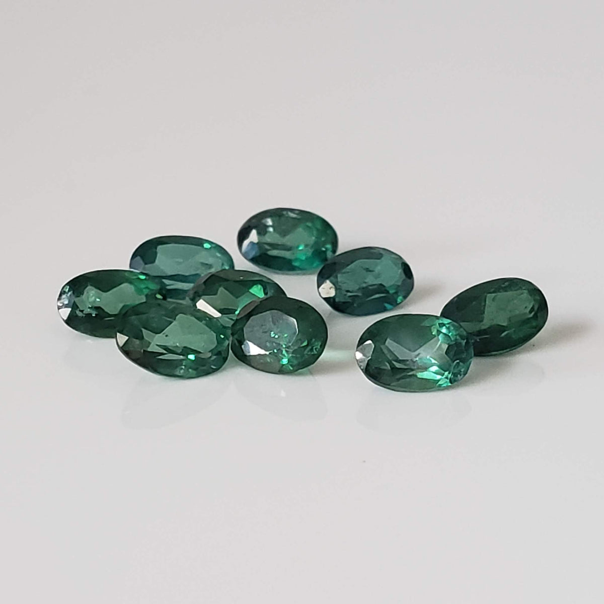  Topaz | 9 Piece Lot | Oval Cut | Emerald Green | 5.8-6.0x3.8-4.0mm 1