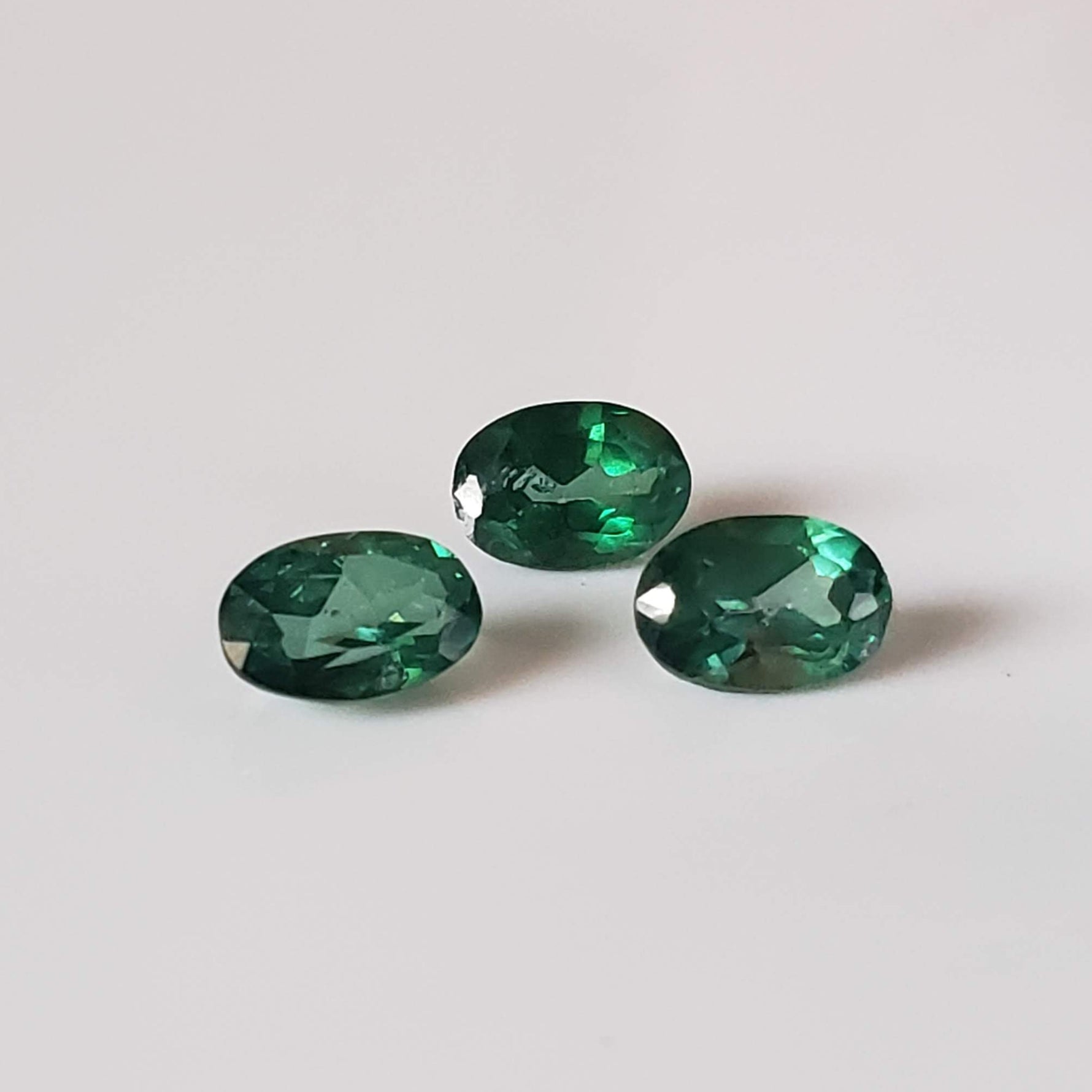  Topaz | 9 Piece Lot | Oval Cut | Emerald Green | 5.8-6.0x3.8-4.0mm 3