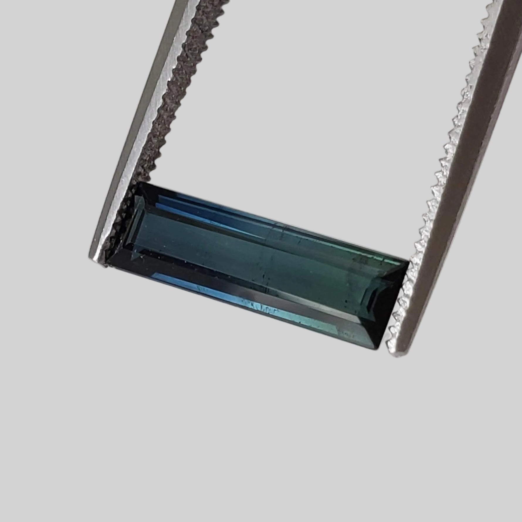  Tourmaline | Baguette Cut | Dark Neon Green | 11.2x3.5mm 0.94ct | Africa 1