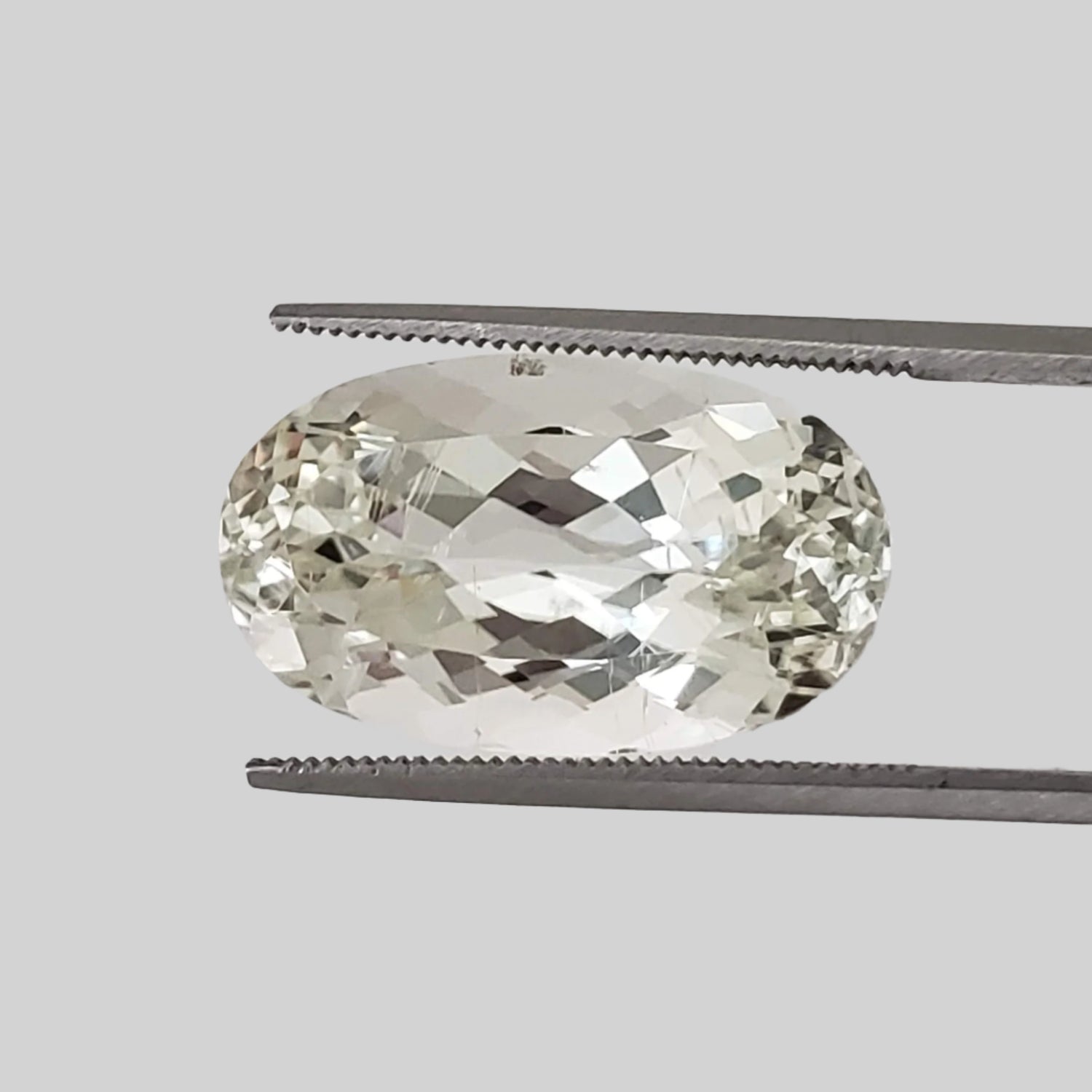  Triphane | Spodumene | Oval Cut | Yellow | 19.7x11.6 mm, 14.6 Ct 