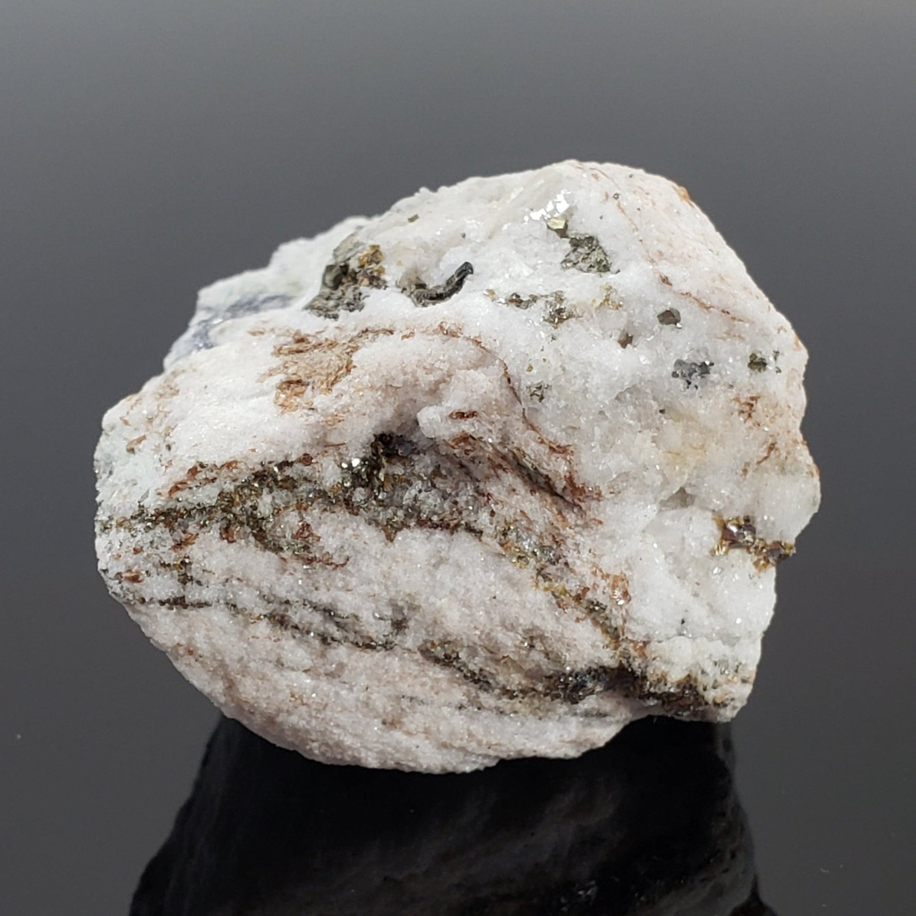   Pyrite, Dravite and Oellacherite on Dolomite | 85 grams | Binn Valley, Switzerland 