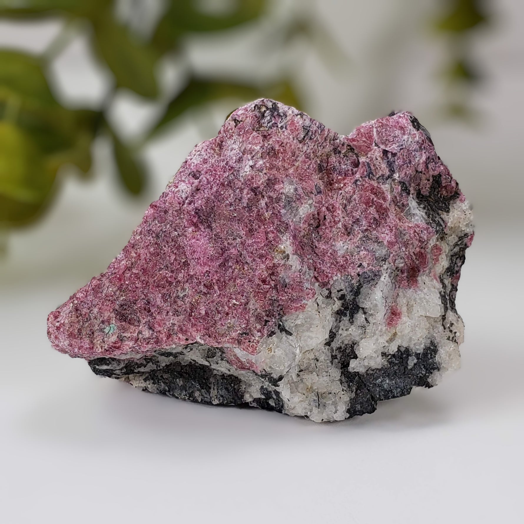  Eudialyte | Fluorescent under UV light | 150 grams | Mont Saint Hilaire, Quebec 