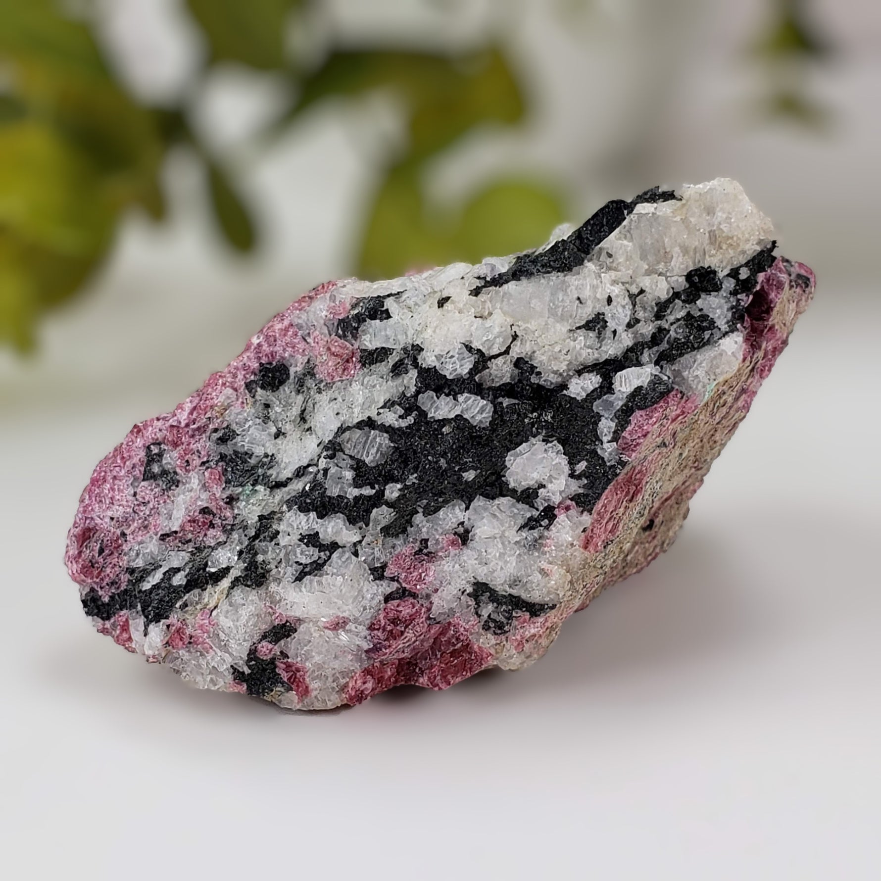  Eudialyte | Fluorescent under UV light | 150 grams | Mont Saint Hilaire, Quebec 