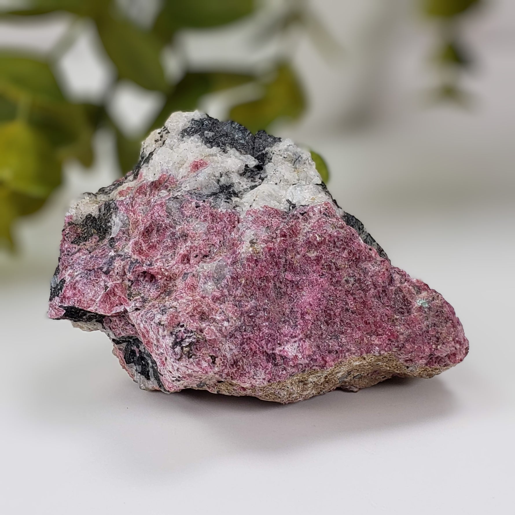  Eudialyte | Fluorescent under UV light | 150 grams | Mont Saint Hilaire, Quebec 