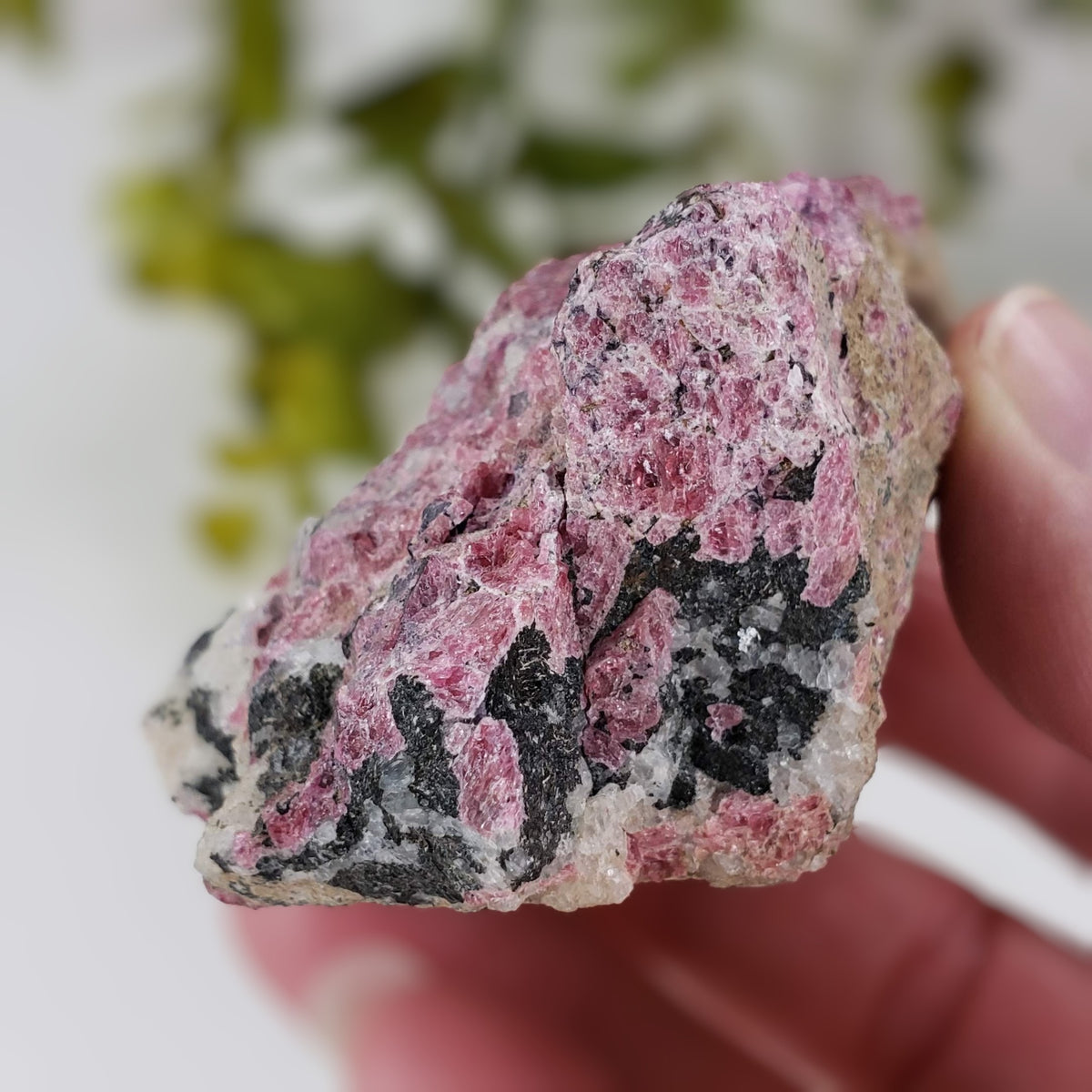  Eudialyte | Fluorescent under UV light | 150 grams | Mont Saint Hilaire, Quebec 