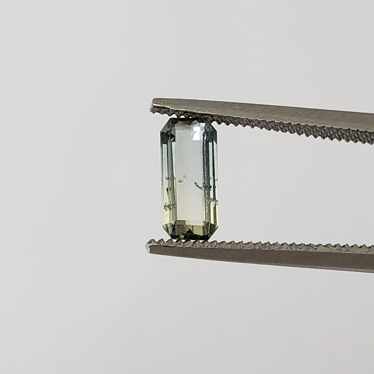 Sapphire | Octagon Cut | Bi-Color Green | 7.5x3.3mm 0.6ct