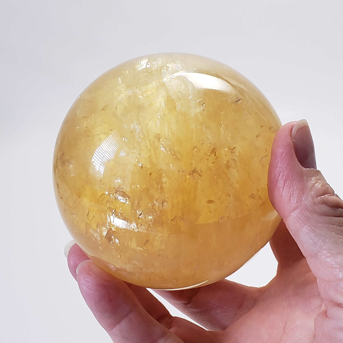  Amber Calcite Sphere 87 mm, 3.4 inches 952 grams China 