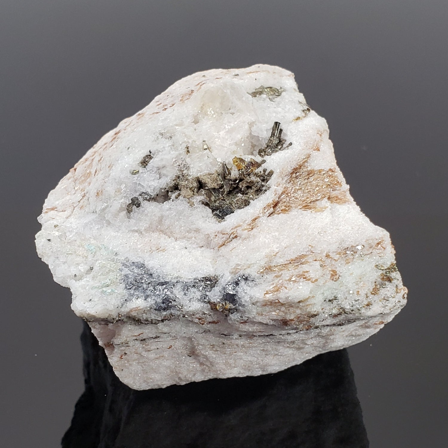 Pyrite, Dravite and Oellacherite on Dolomite Marble | 85 grams | Lengenback Quarry | Binn Valley, Switzerland