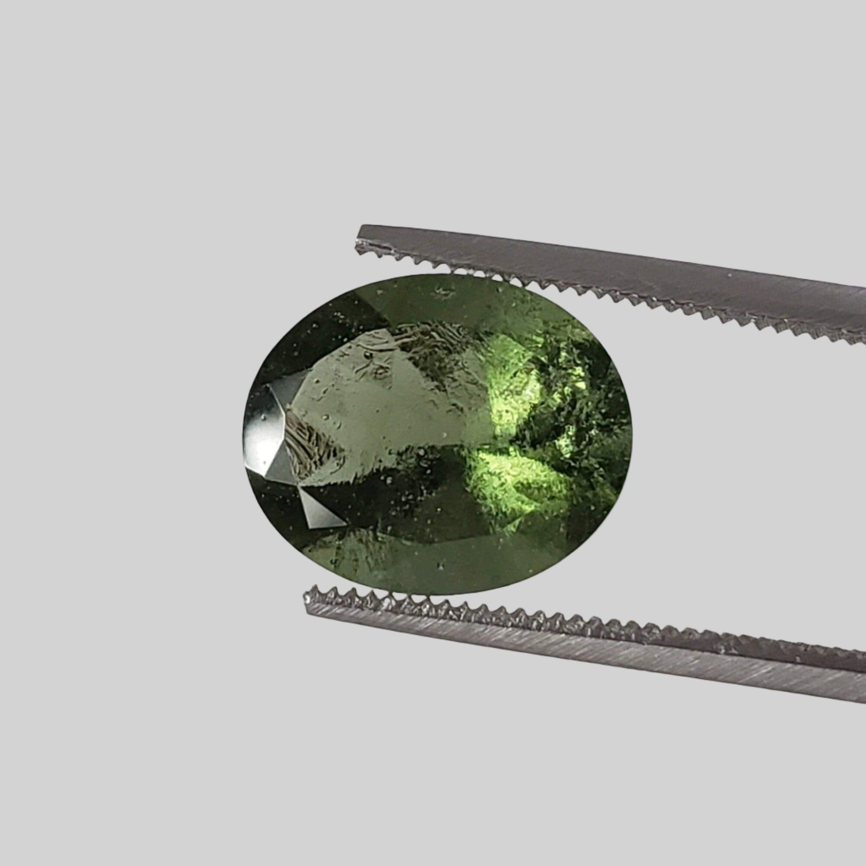  Authentic Moldavite | Oval Cut | 11x9mm | Chlum Region, Czech Republic 