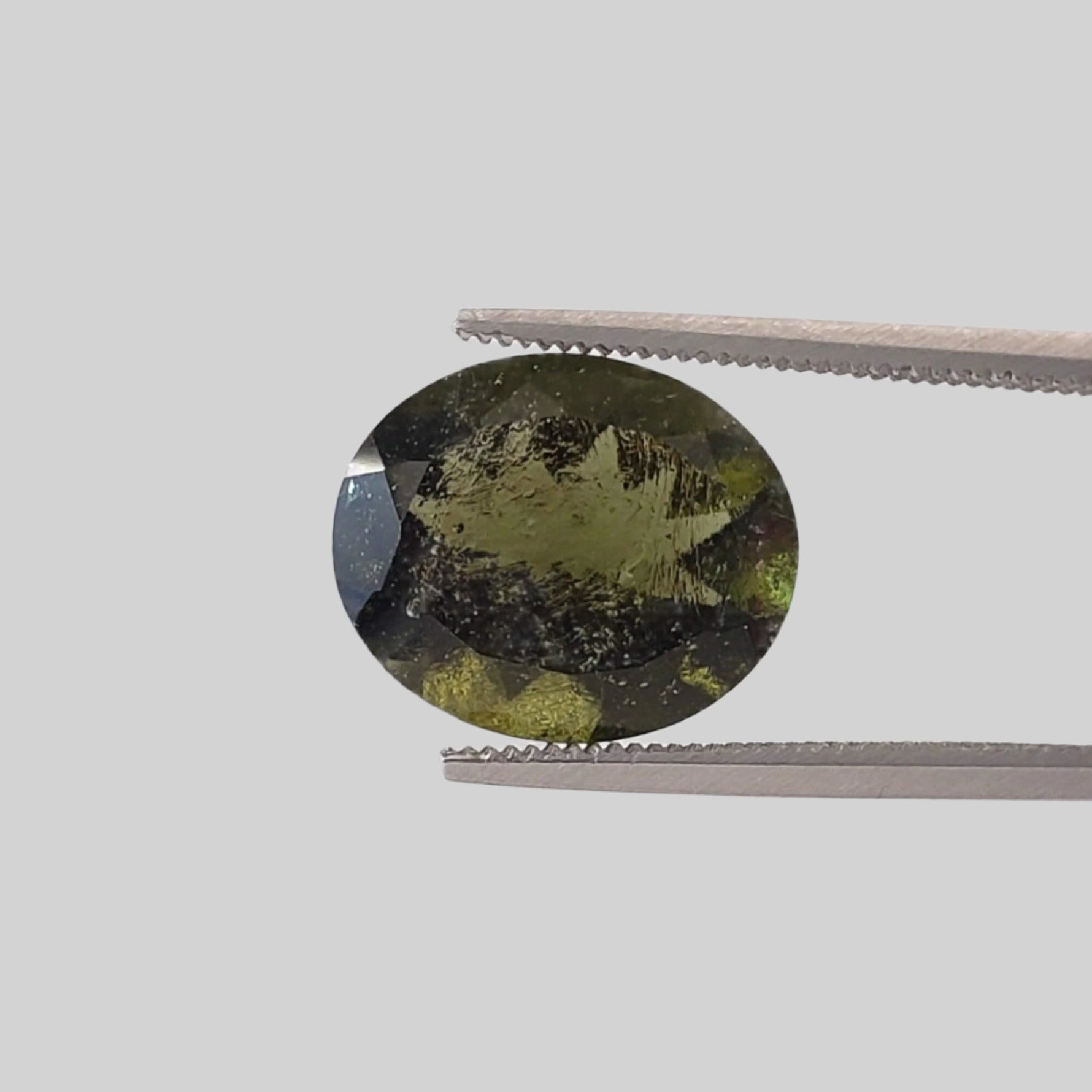  Authentic Moldavite | Oval Cut | 12x10mm | Chlum Region, Czech Republic 