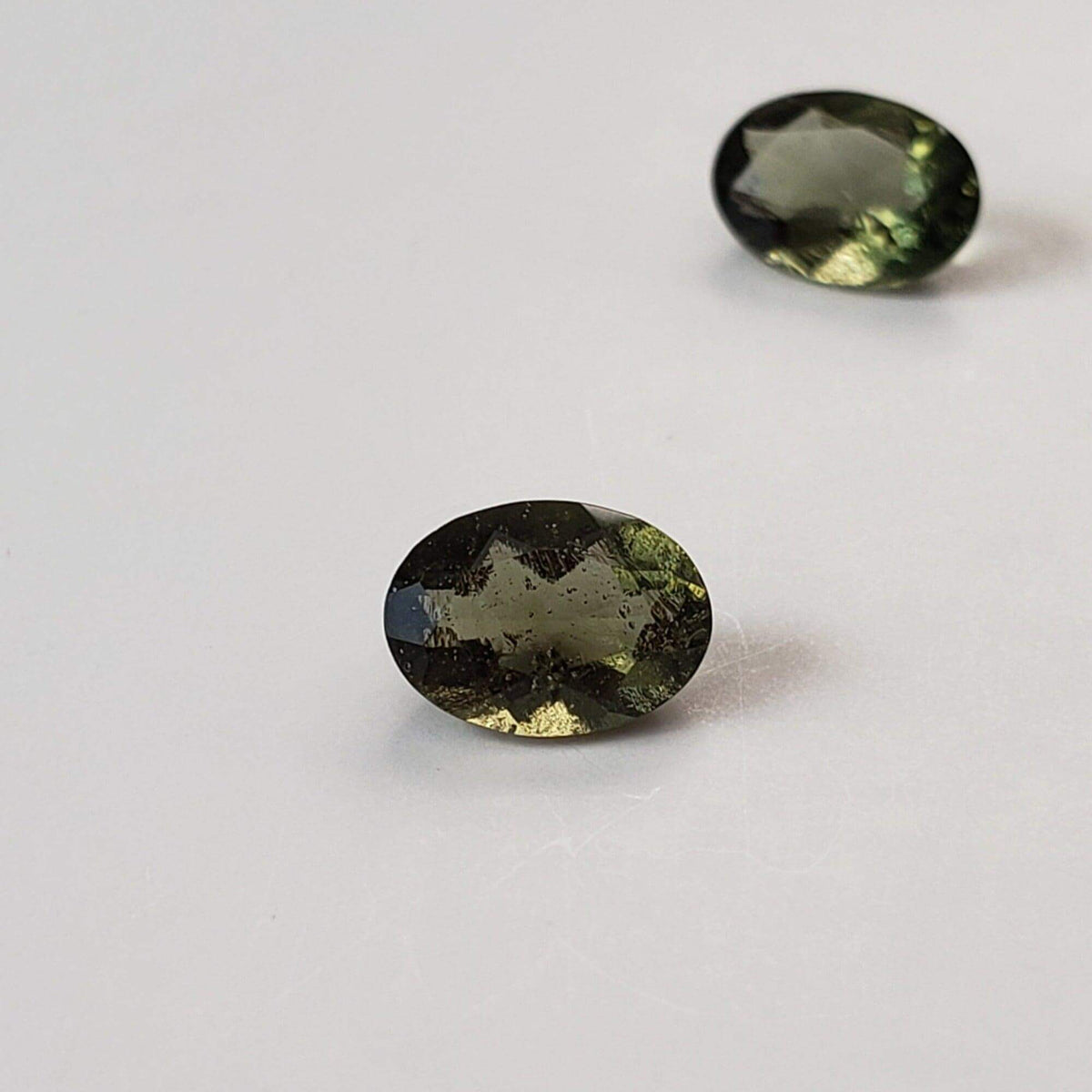  Authentic Moldavite | Oval Cut | 7x5mm | Chlum Region, Czech Republic | SO24 1