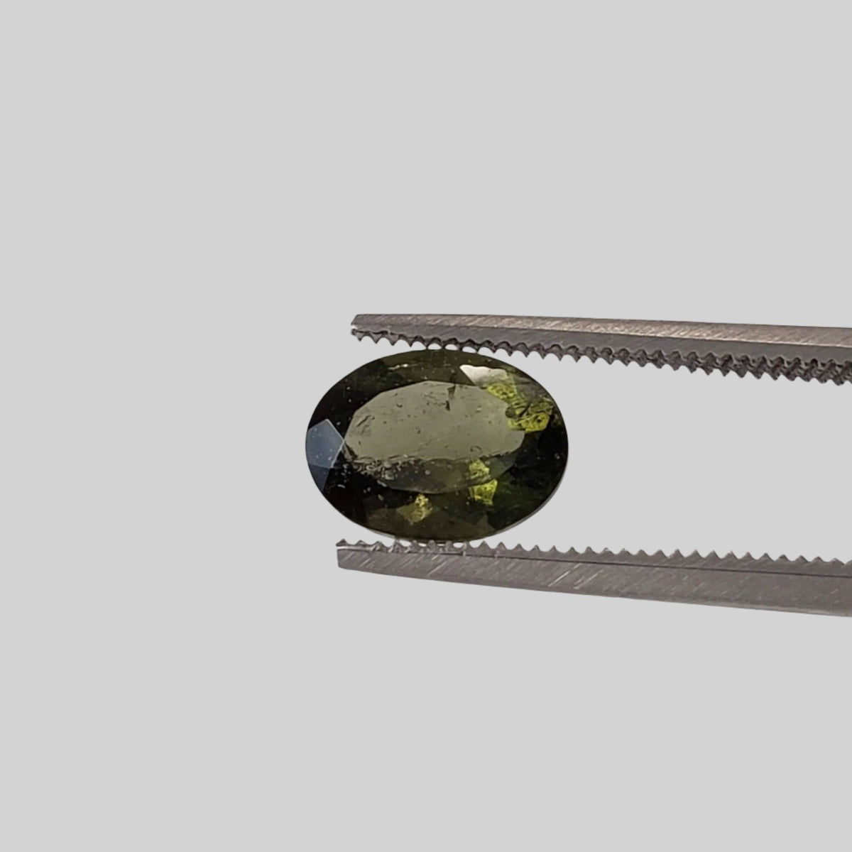  Authentic Moldavite | Oval Cut | 8x6mm | Chlum Region, Czech Republic | SO24 