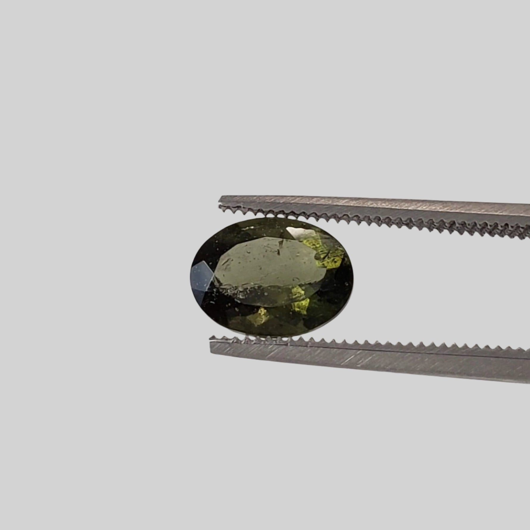  Authentic Moldavite | Oval Cut | 8x6mm | Chlum Region, Czech Republic | SO24 