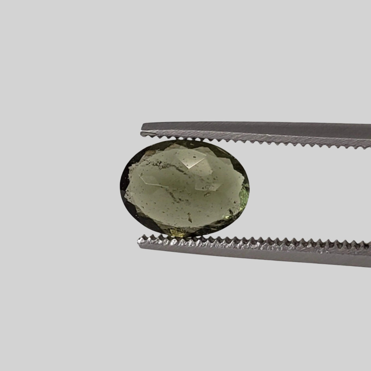  Authentic Moldavite | Oval Cut | 8x6mm | Chlum Region, Czech Republic | SO24 1