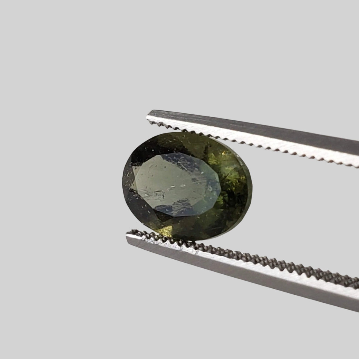  Authentic Moldavite | Oval Cut | 8x6mm | Chlum Region, Czech Republic | SO24 2