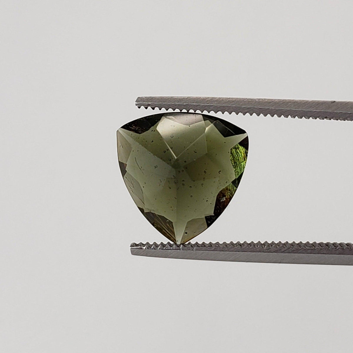  Authentic Moldavite | Trilliant Cut | 10mm | Chlum Region, Czech Republic | SO24 1