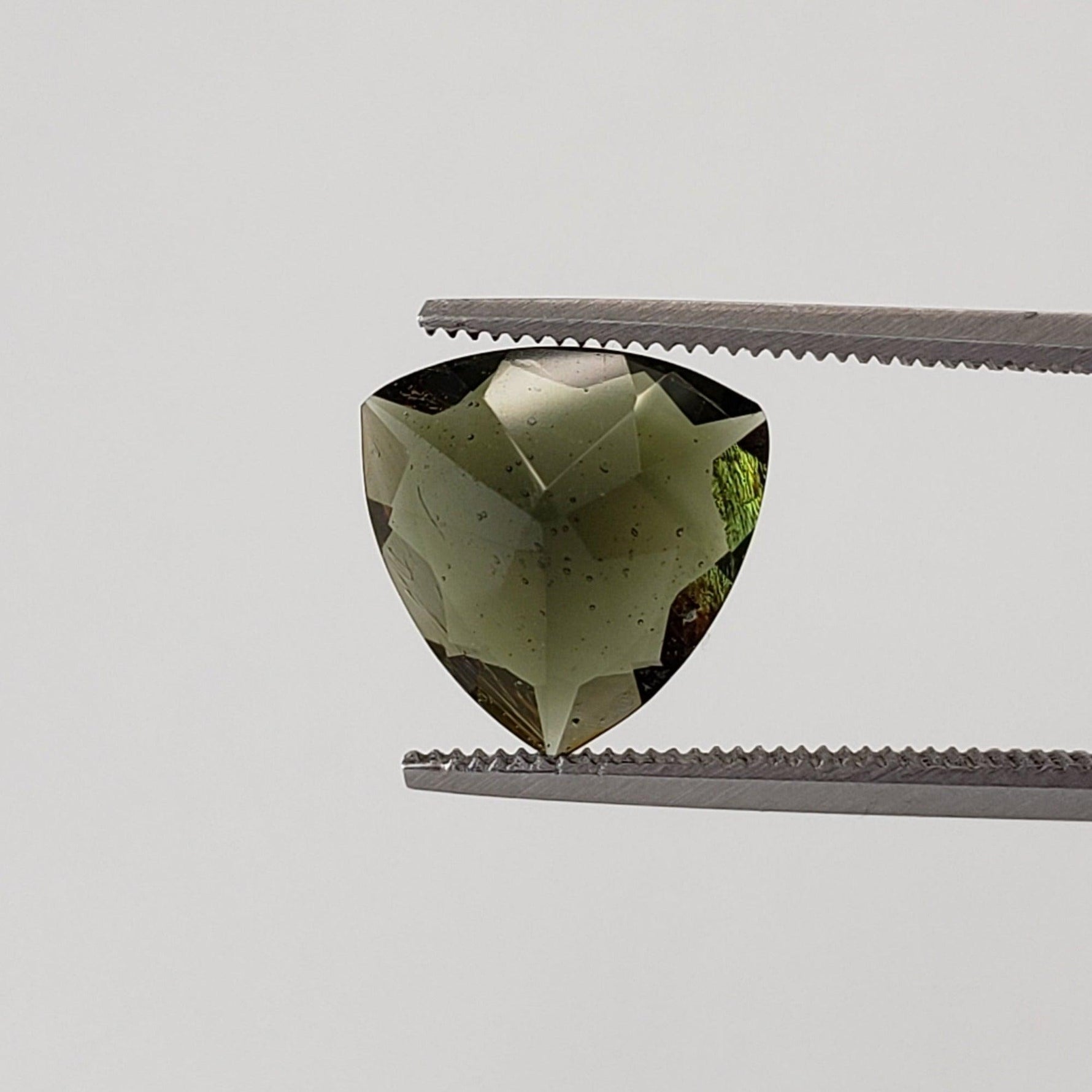 Authentic Moldavite | Trilliant Cut | 10mm | Chlum Region, Czech Republic | SO24 1