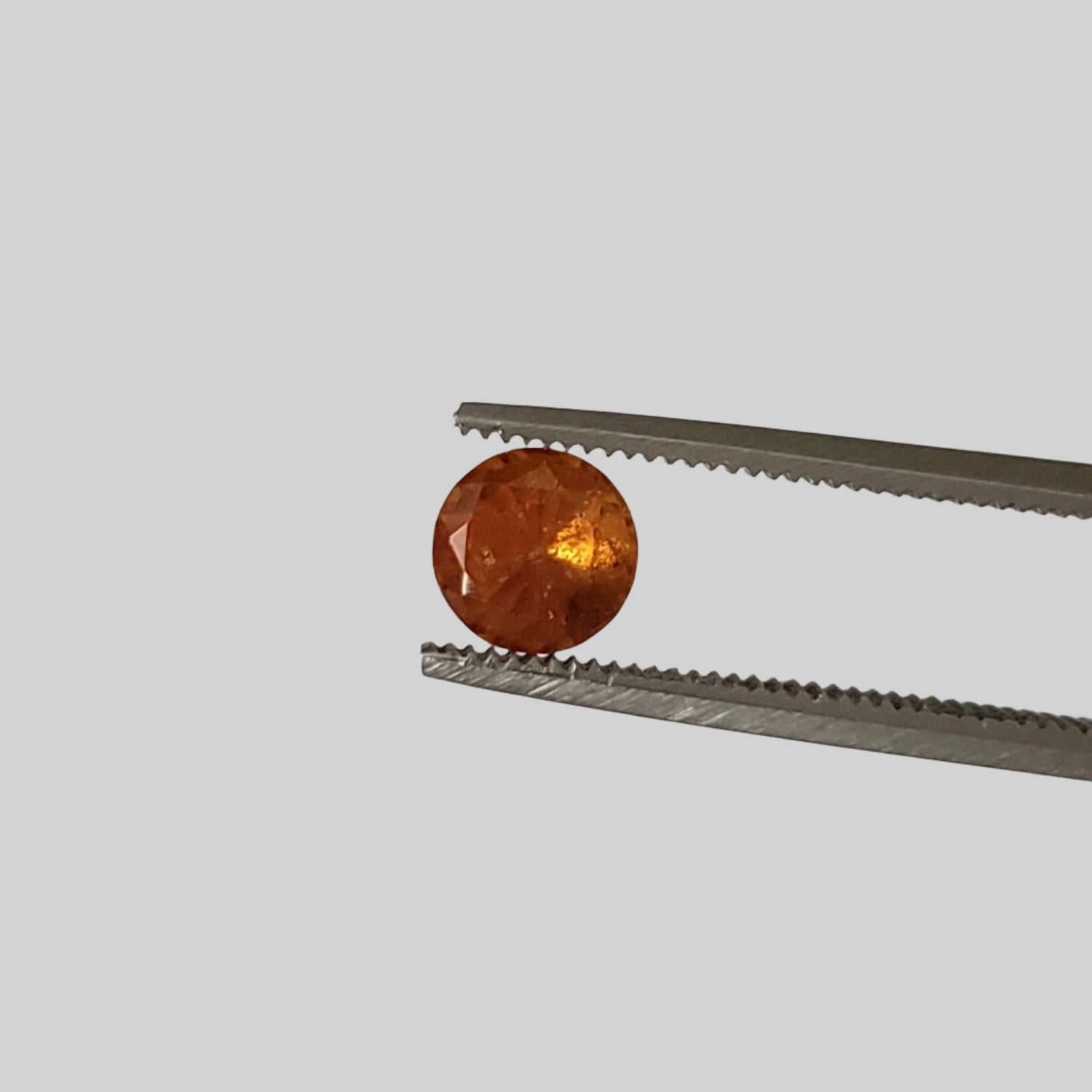  Hessonite Garnet | Unheated | Cinnamon Stone | Round Cut | Orange | 5.2mm 0.79ct | Madagascar 1