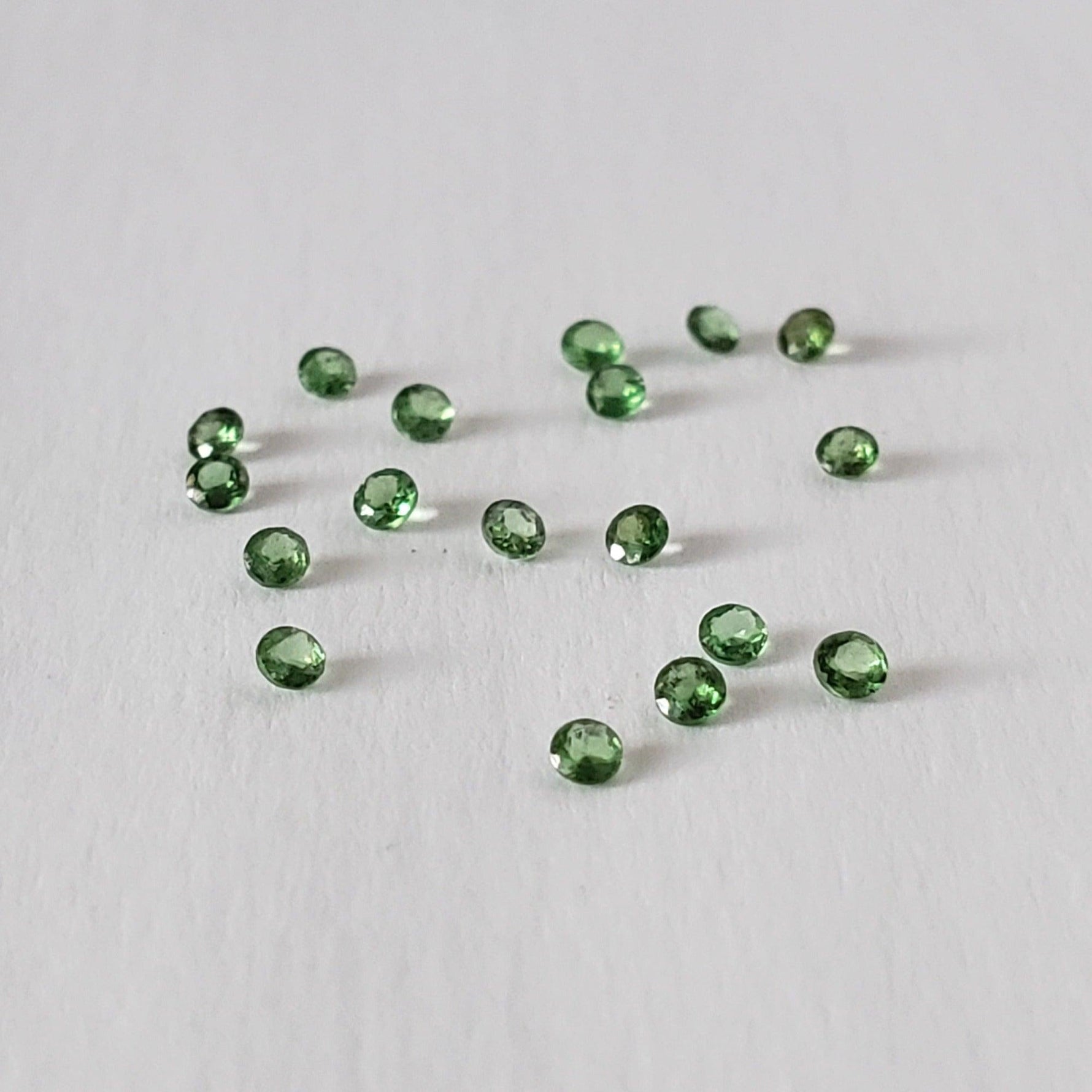  Tsavorite | Round Cut | Green | 1.5mm 3