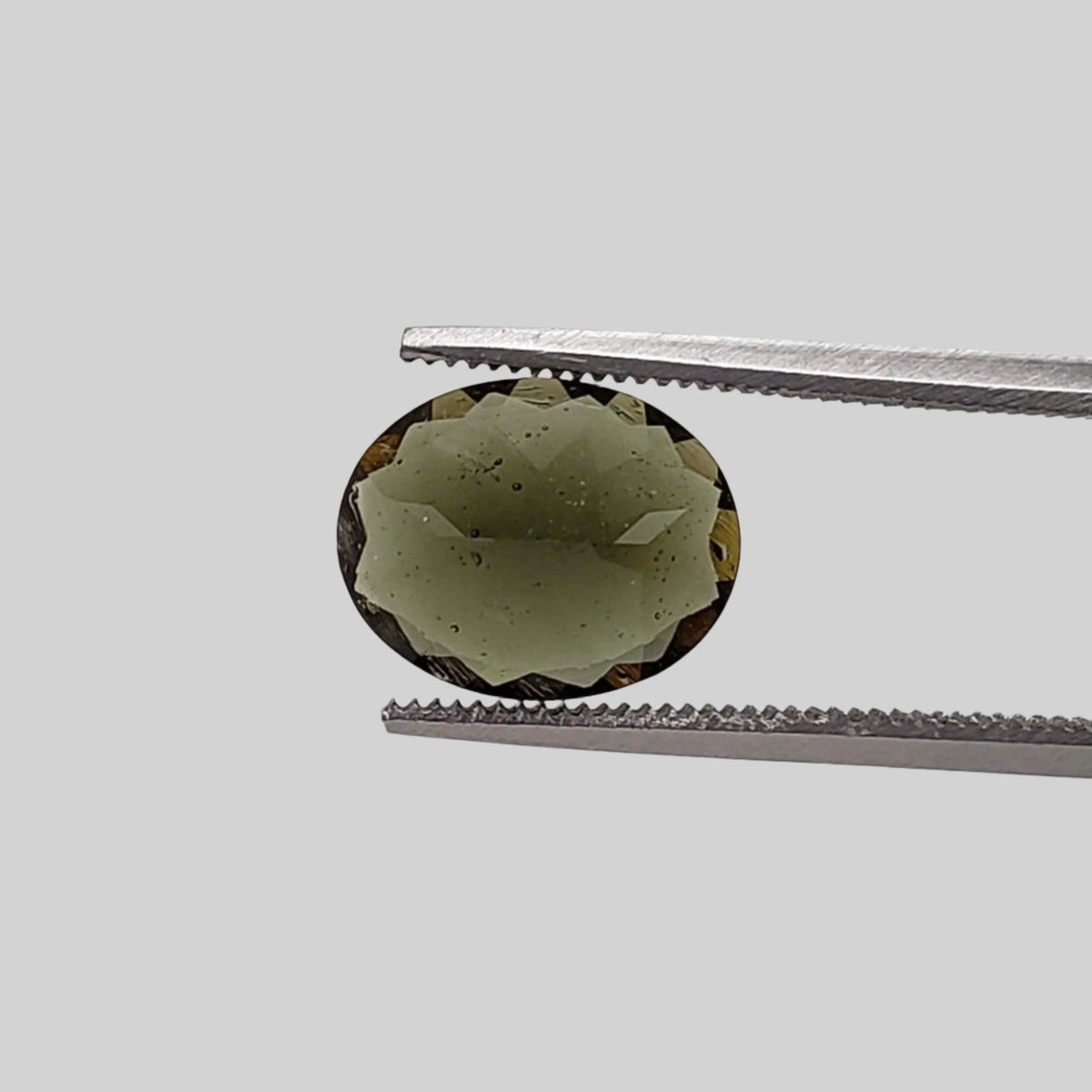 Authentic Moldavite | Oval Cut | 10x8mm | Chlum Region, Czech Republic