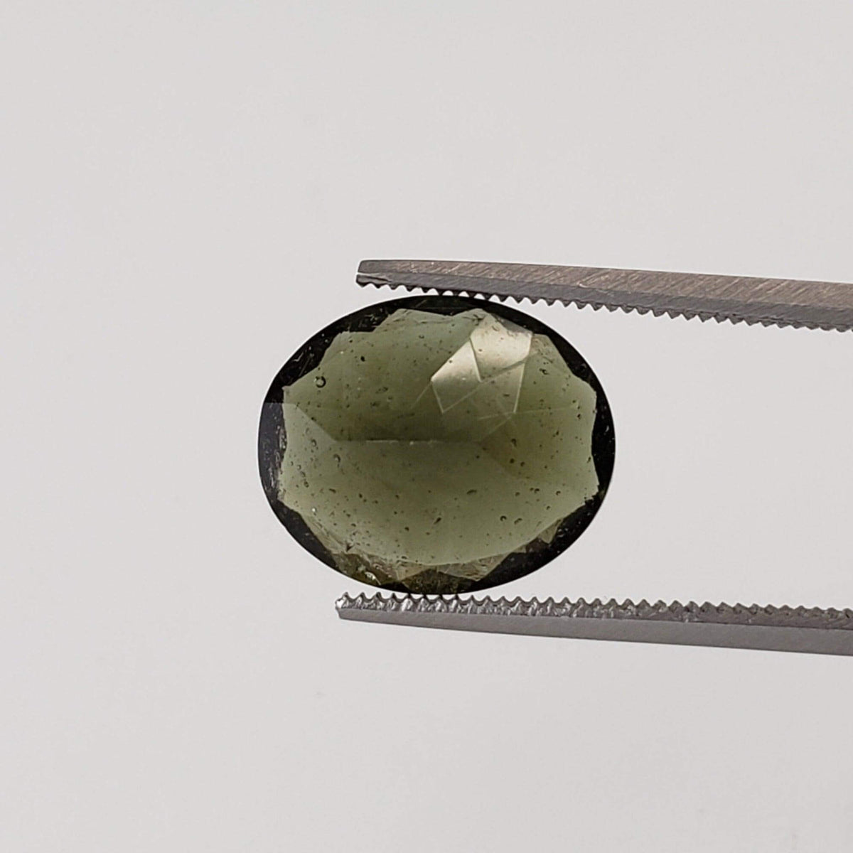 Authentic Moldavite | Oval Cut | 12x10mm | Chlum Region, Czech Republic