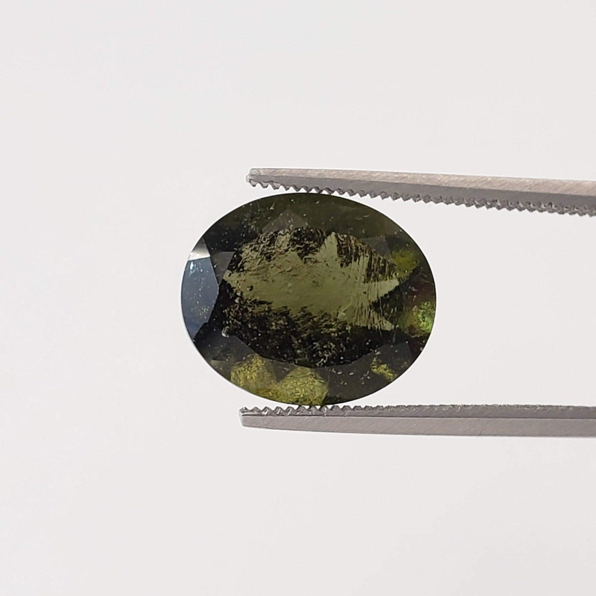 Authentic Moldavite | Oval Cut | 12x10mm | Chlum Region, Czech Republic