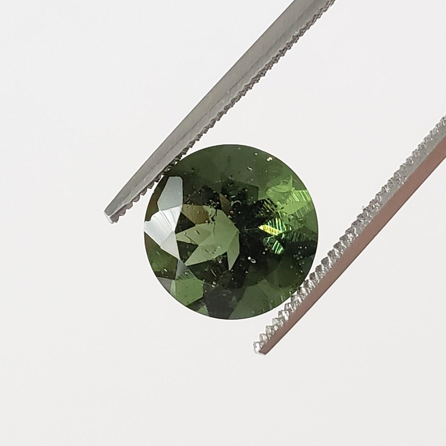 Authentic Moldavite | Round Cut | 9mm, 2.25ct | Chlum Region, Czech Republic | Canagem.com