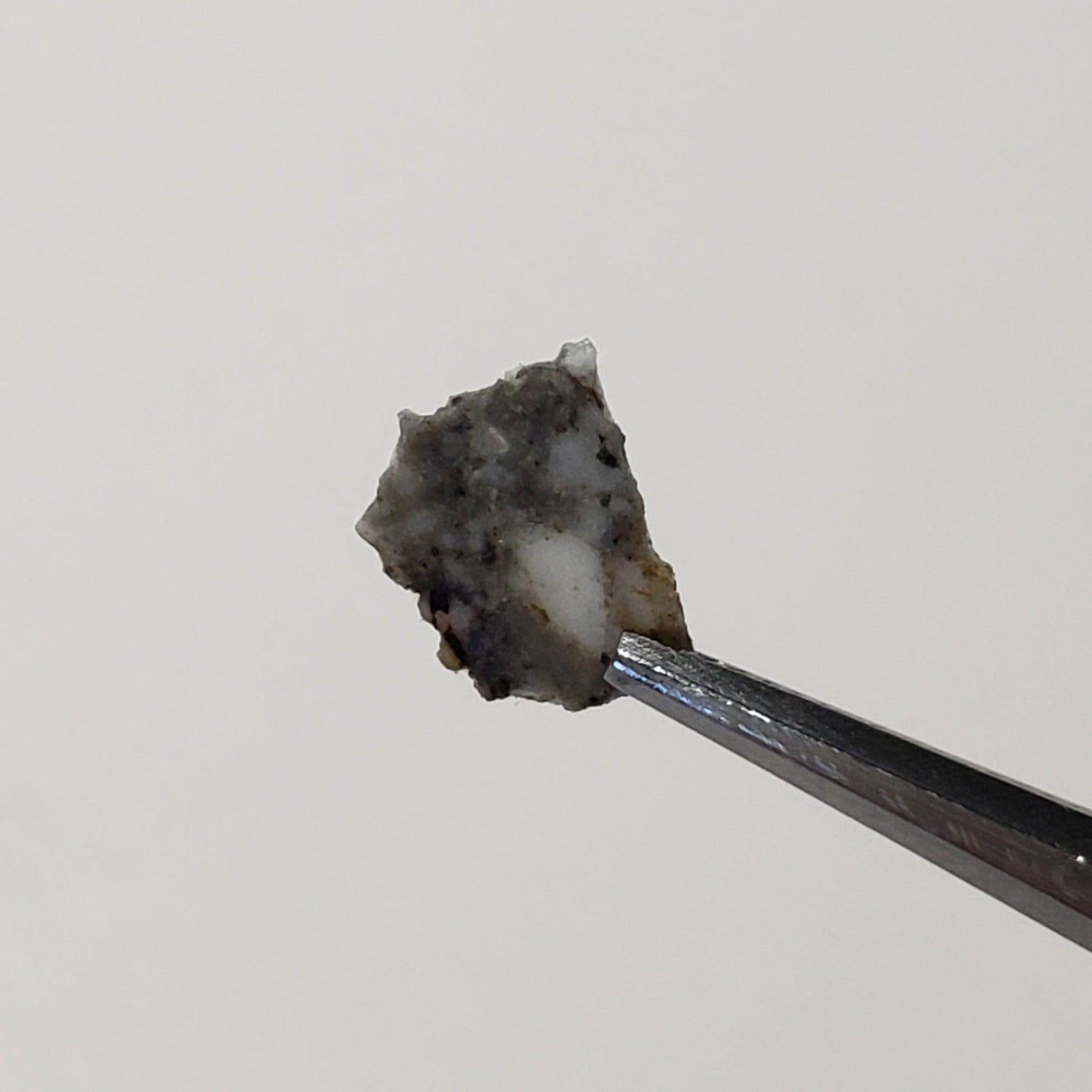 Dhofar 1085 Meteorite | 0.040 Gr | Part Slice | Lunar Impact Melt Breccia | Moon Rock | Low TKW
