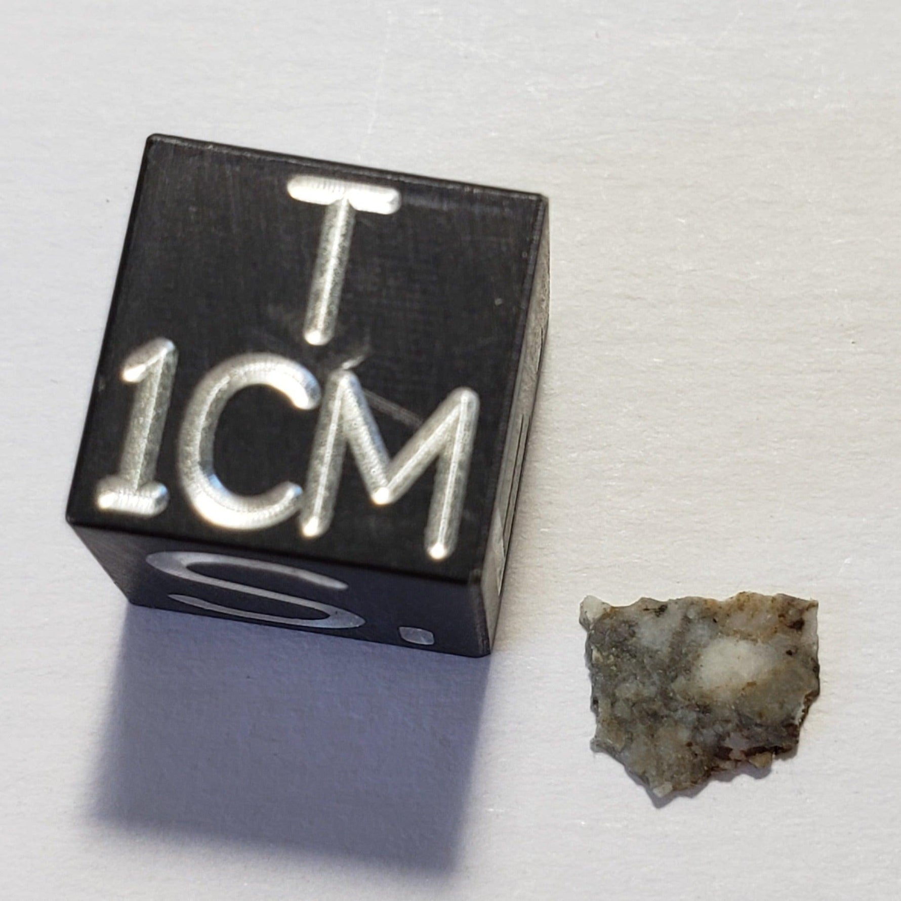 Dhofar 1085 Meteorite | 40 mg | Part Slice | Lunar Impact Melt Breccia | Moon Rock | Low TKW