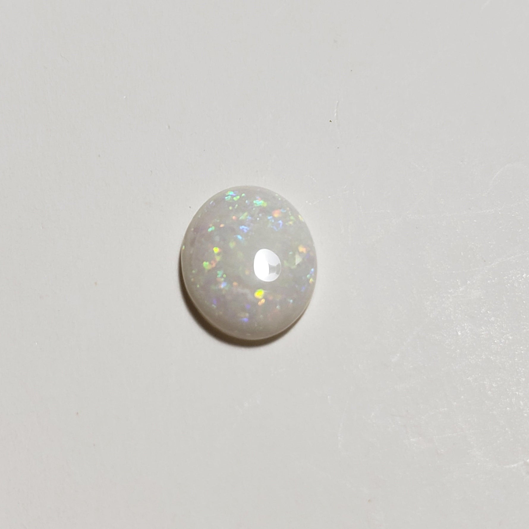  Opal Oval Cabochon Rainbow 11x9mm 1.7ct 