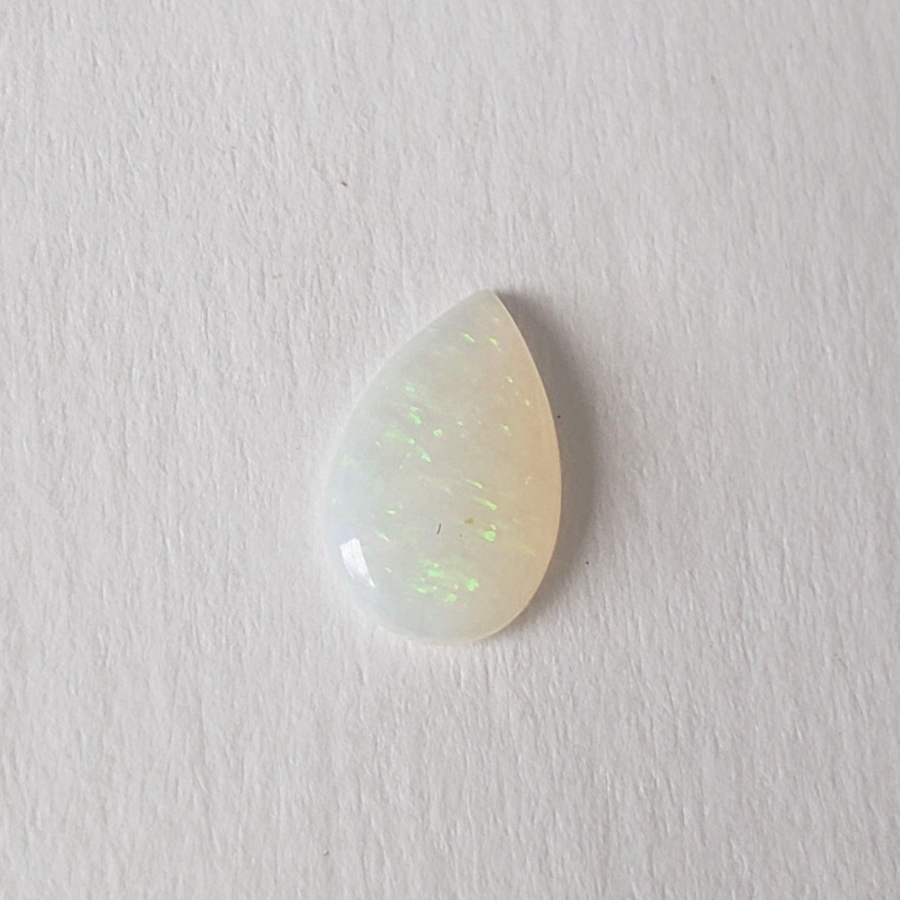 Opal | Pear Shape Cabochon | Rainbow | 9x6mm 0.5ct